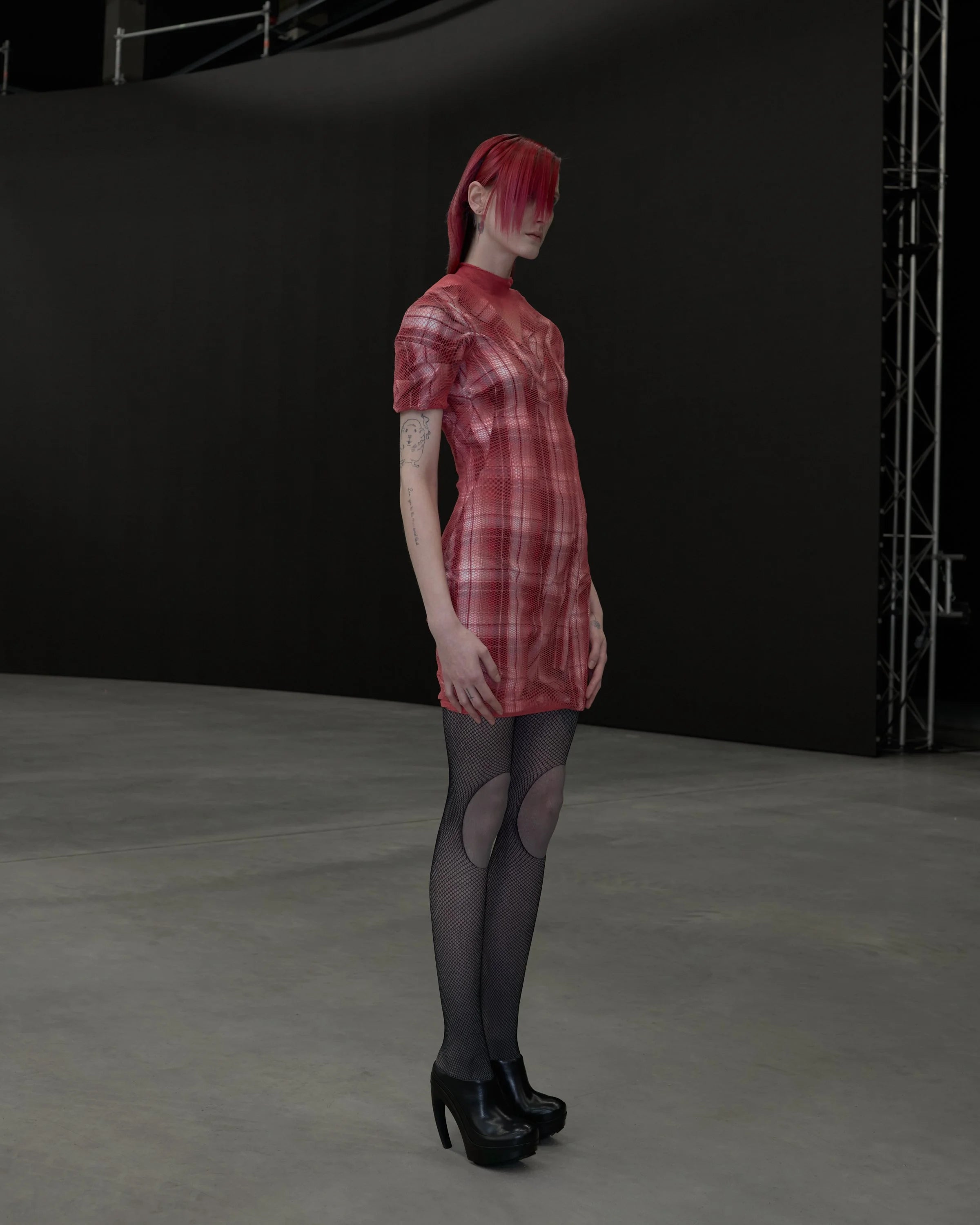 Fishnet-layered plaid kittel dress