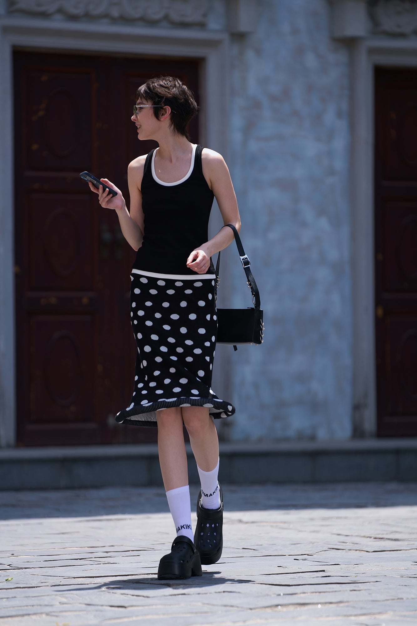 Twisted polka dot knitted half skirt