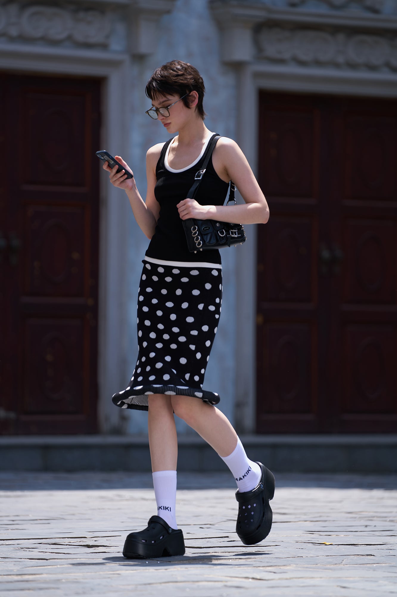 Twisted polka dot knitted half skirt