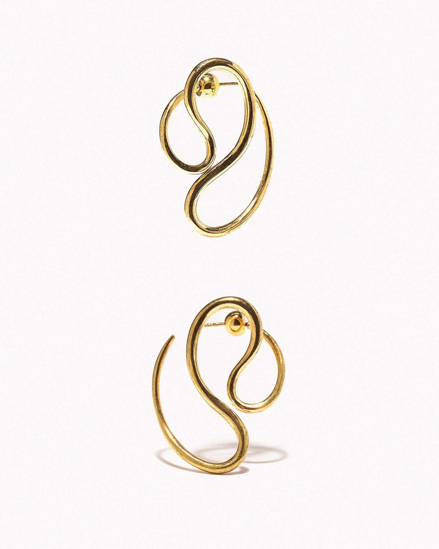 P continua earrings