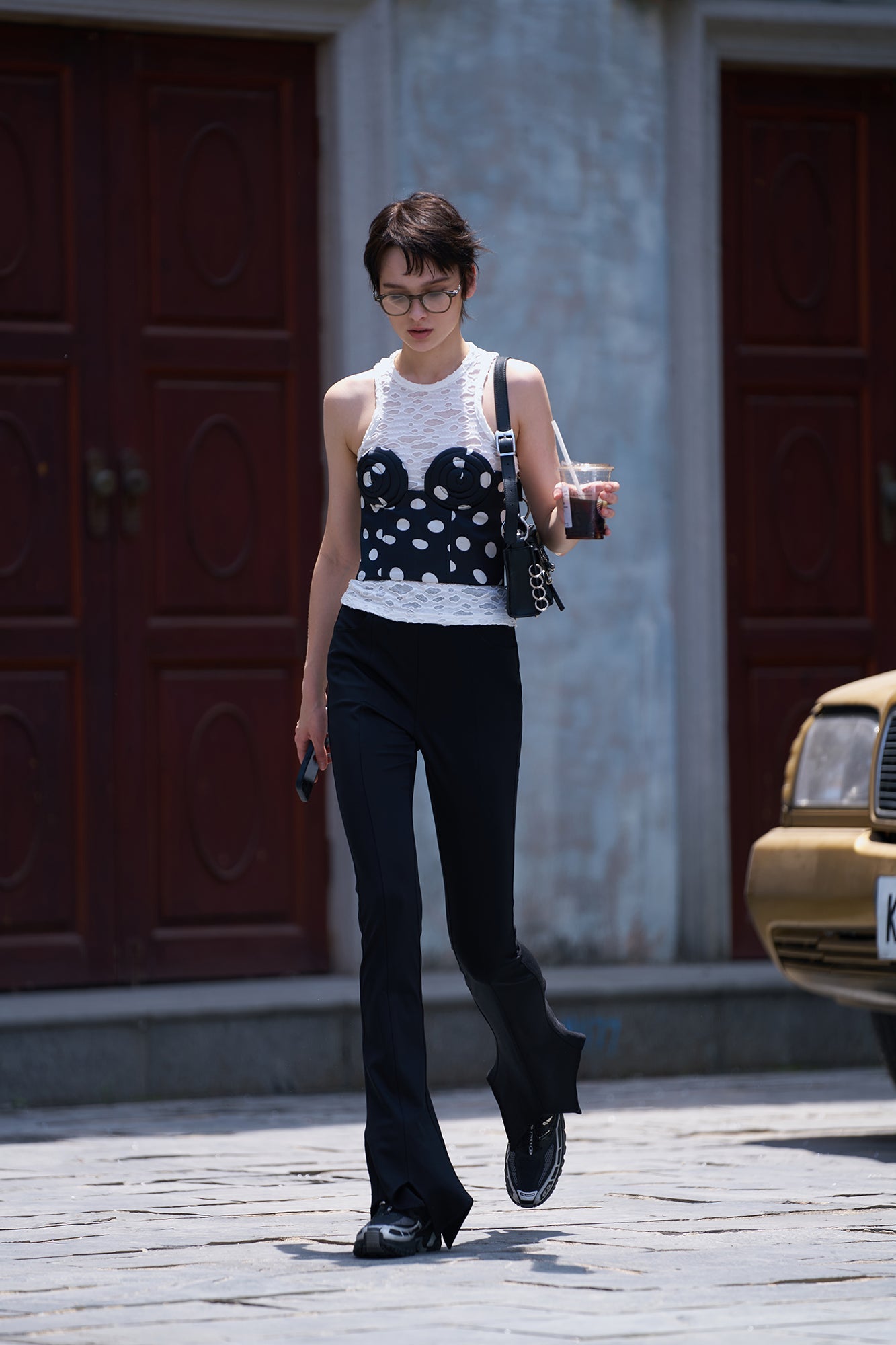 Twisted polka dot whirlpool shaped bra top