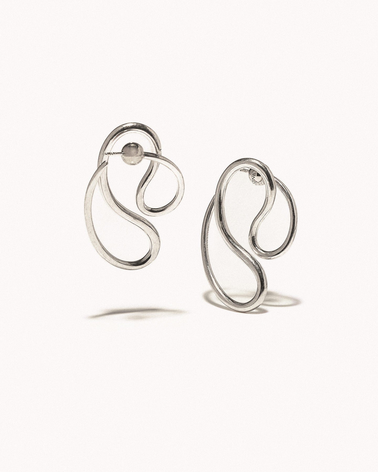 P continua earrings