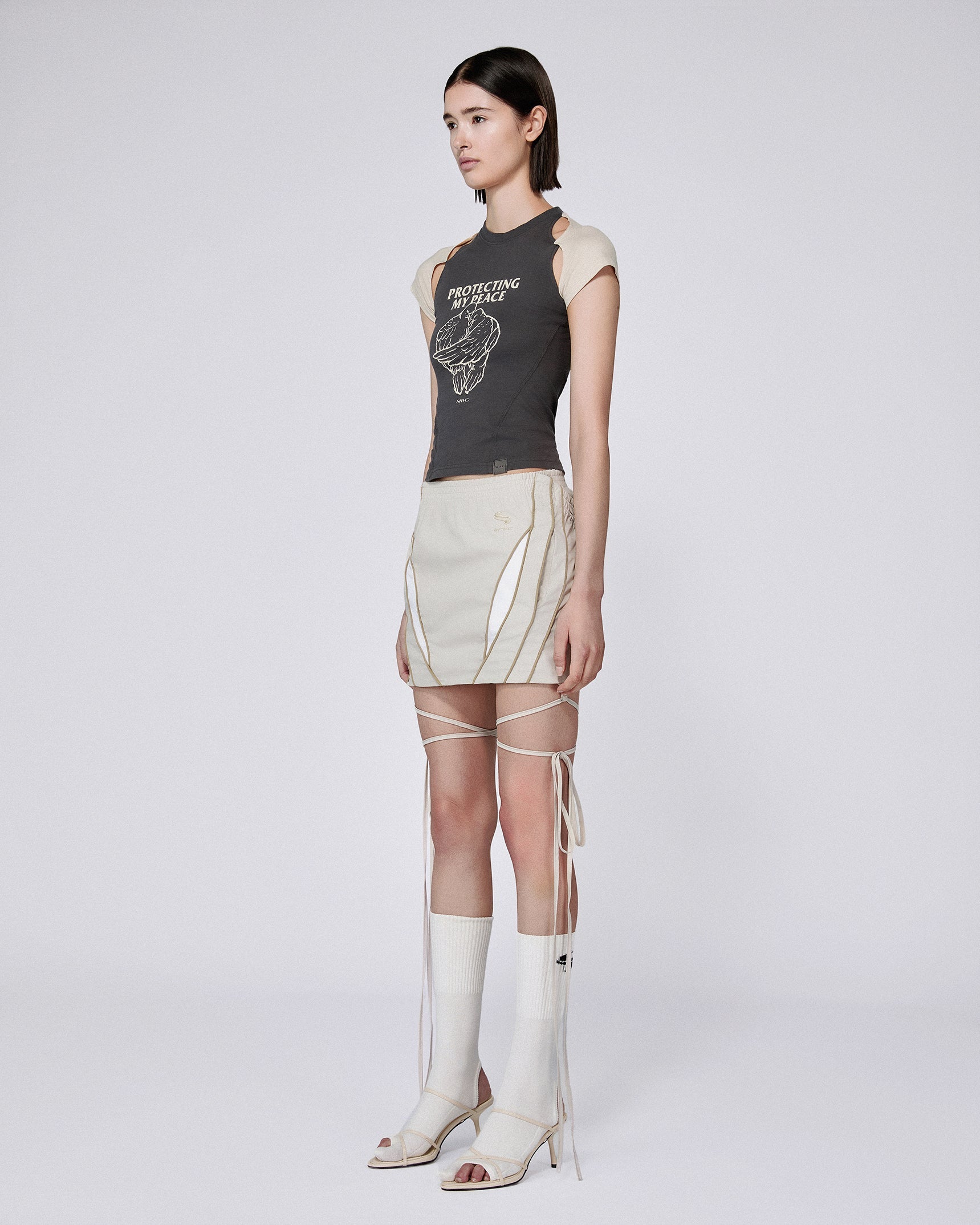 Slash track skirt stone