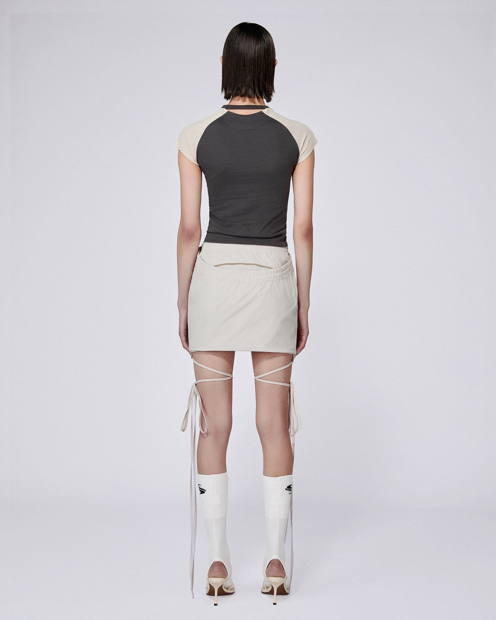 Slash track skirt stone