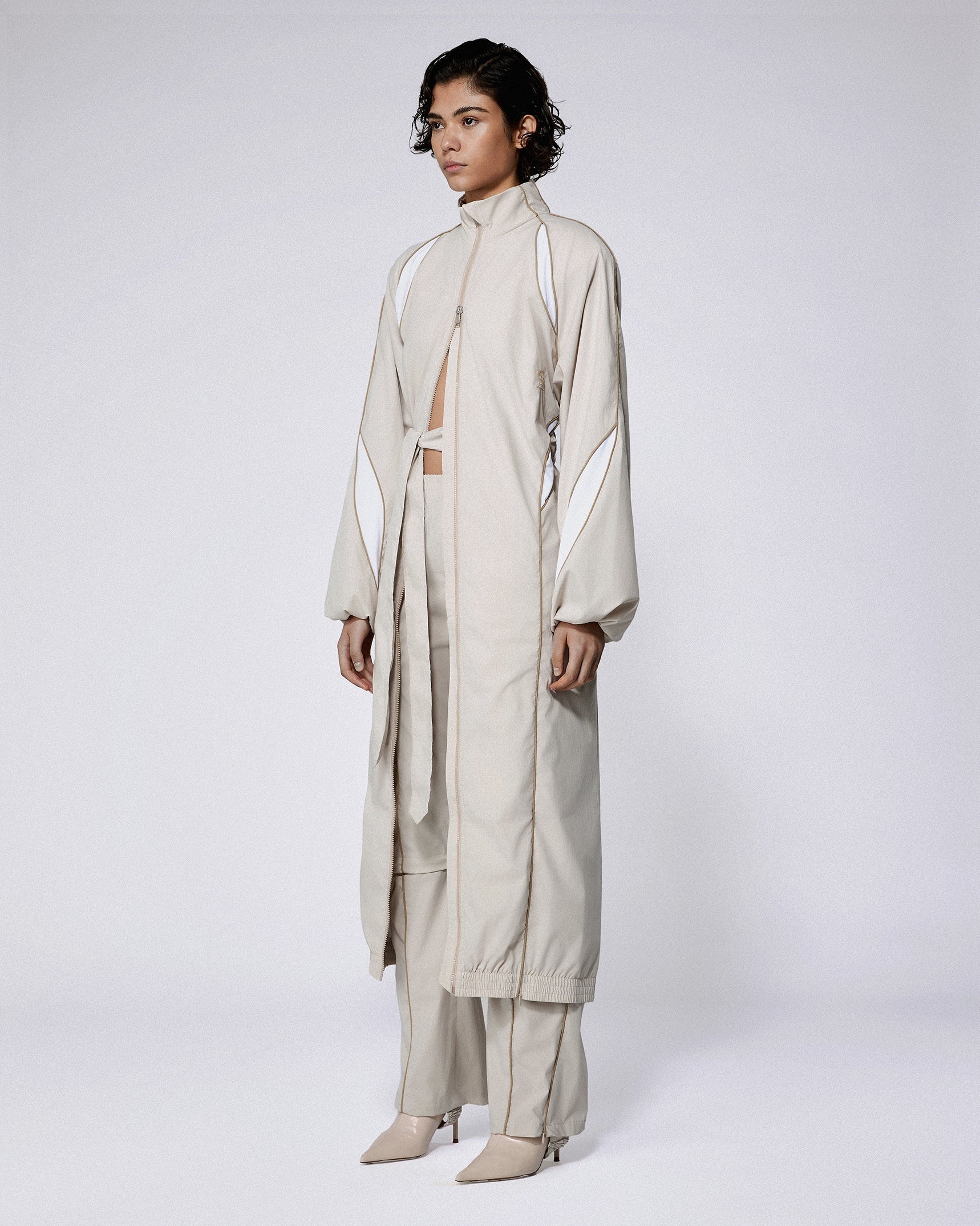 Slash track coat stone