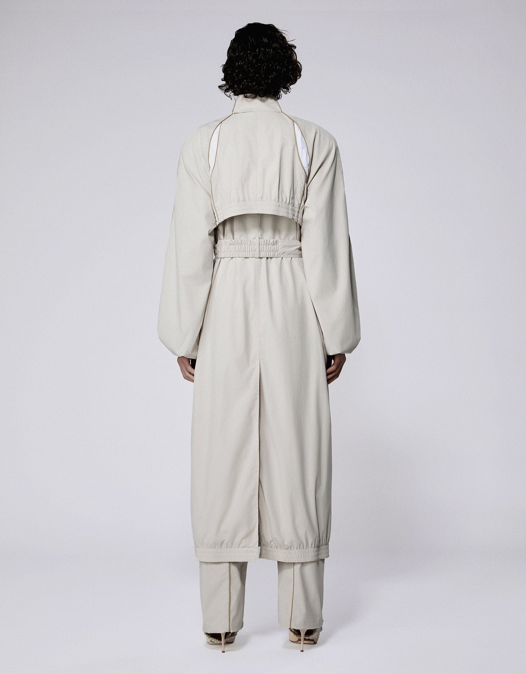 Slash track coat stone