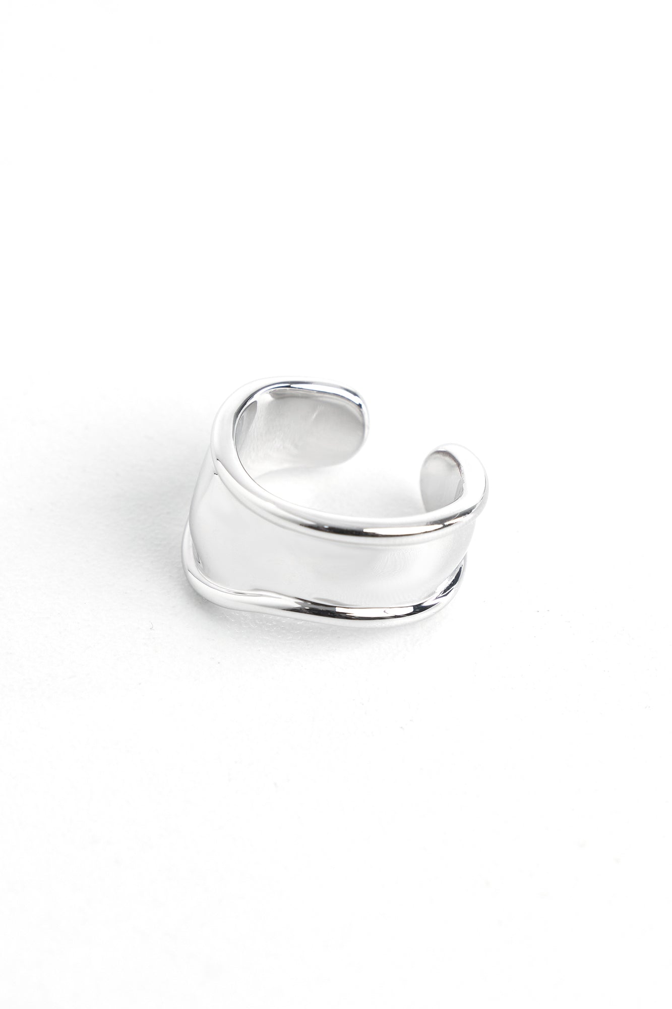 Mirror shaped irregular opening ring