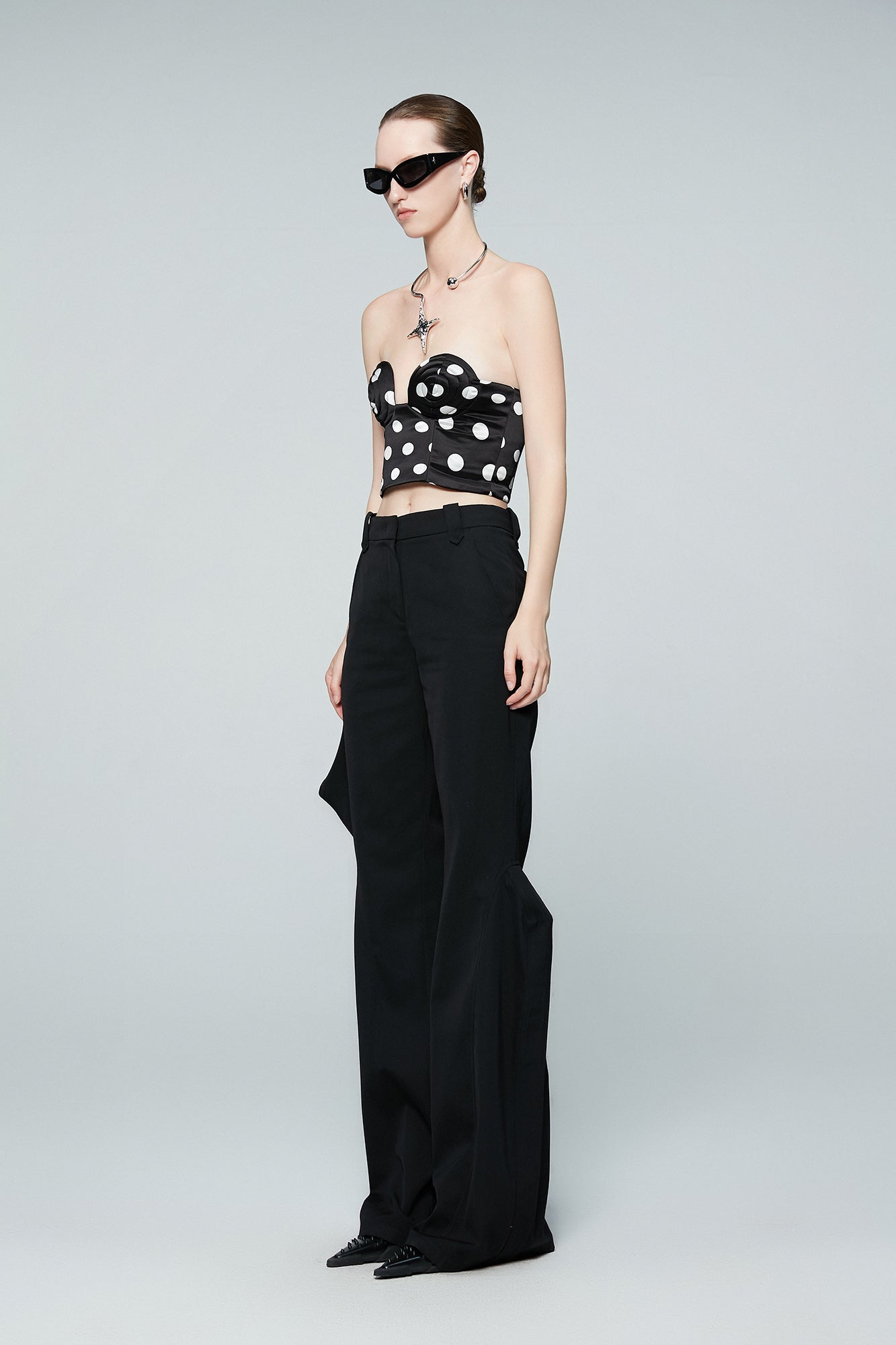 Twisted polka dot whirlpool shaped bra top