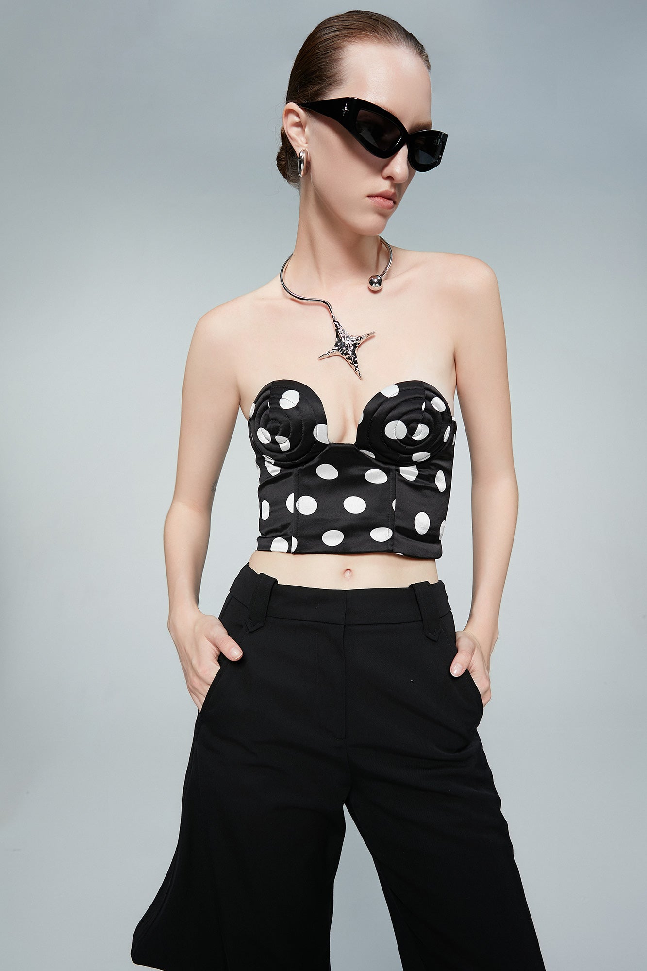 Twisted polka dot whirlpool shaped bra top