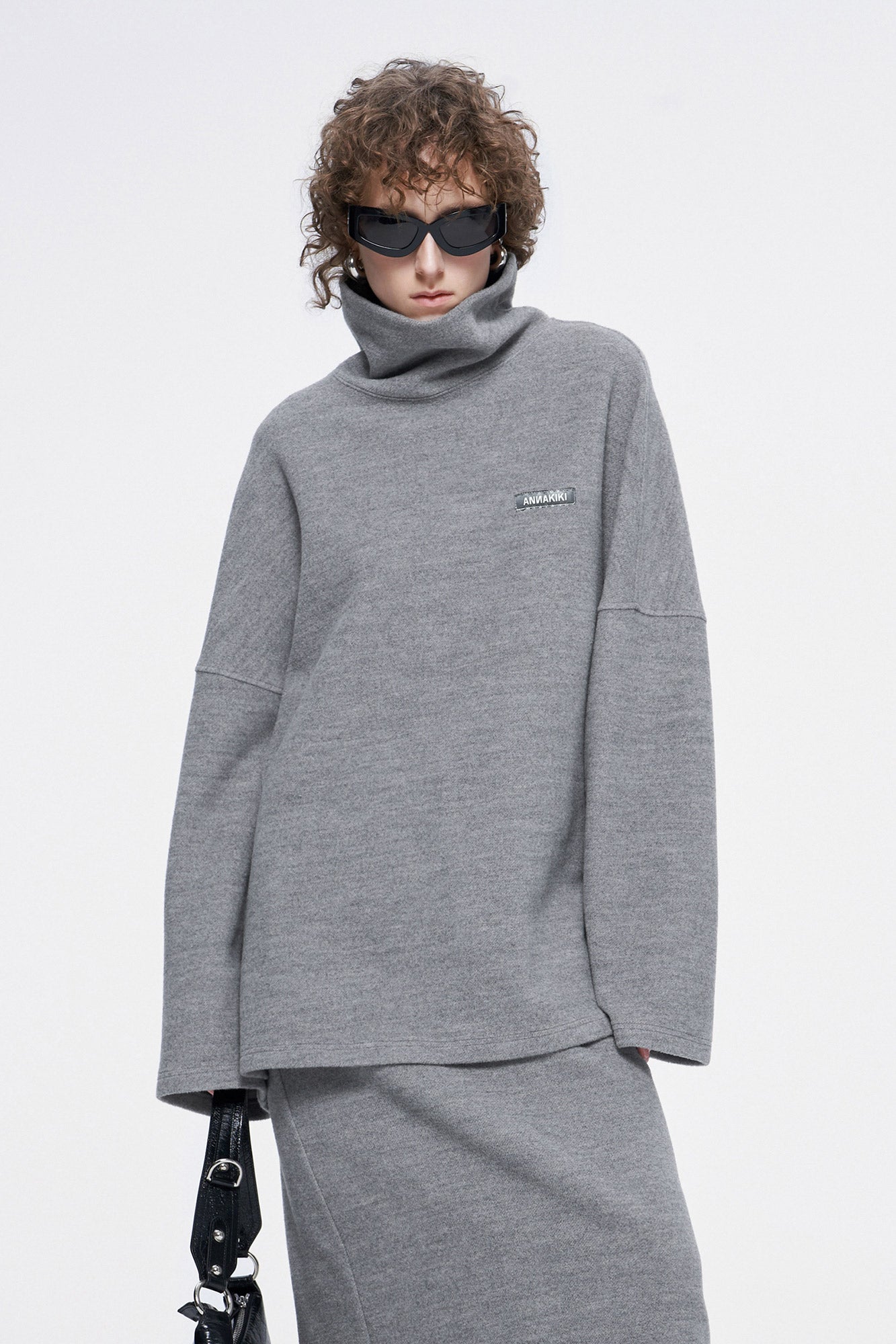 High-necked sweater with a loose silhouette