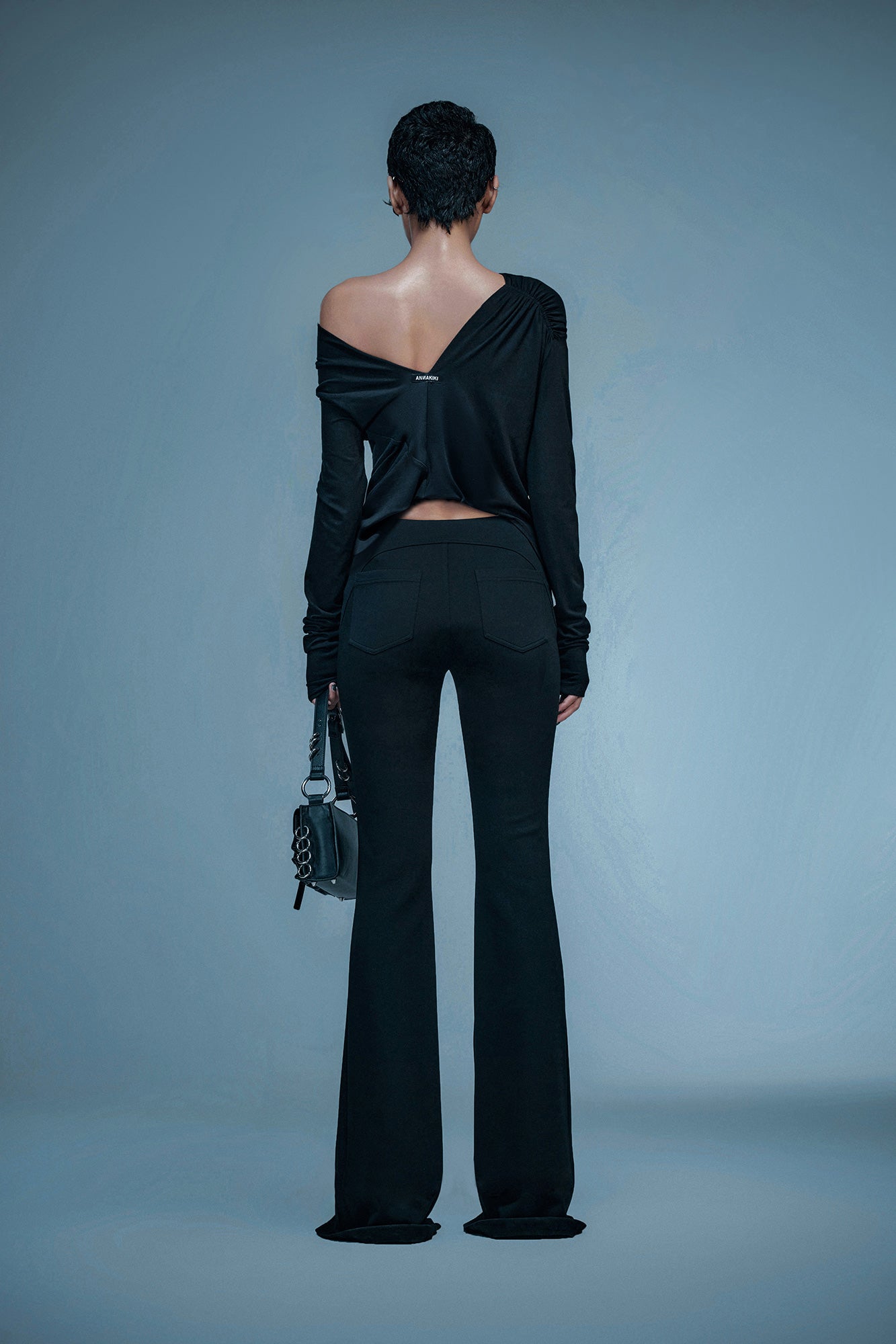 Cut-out pleated top with cutout back