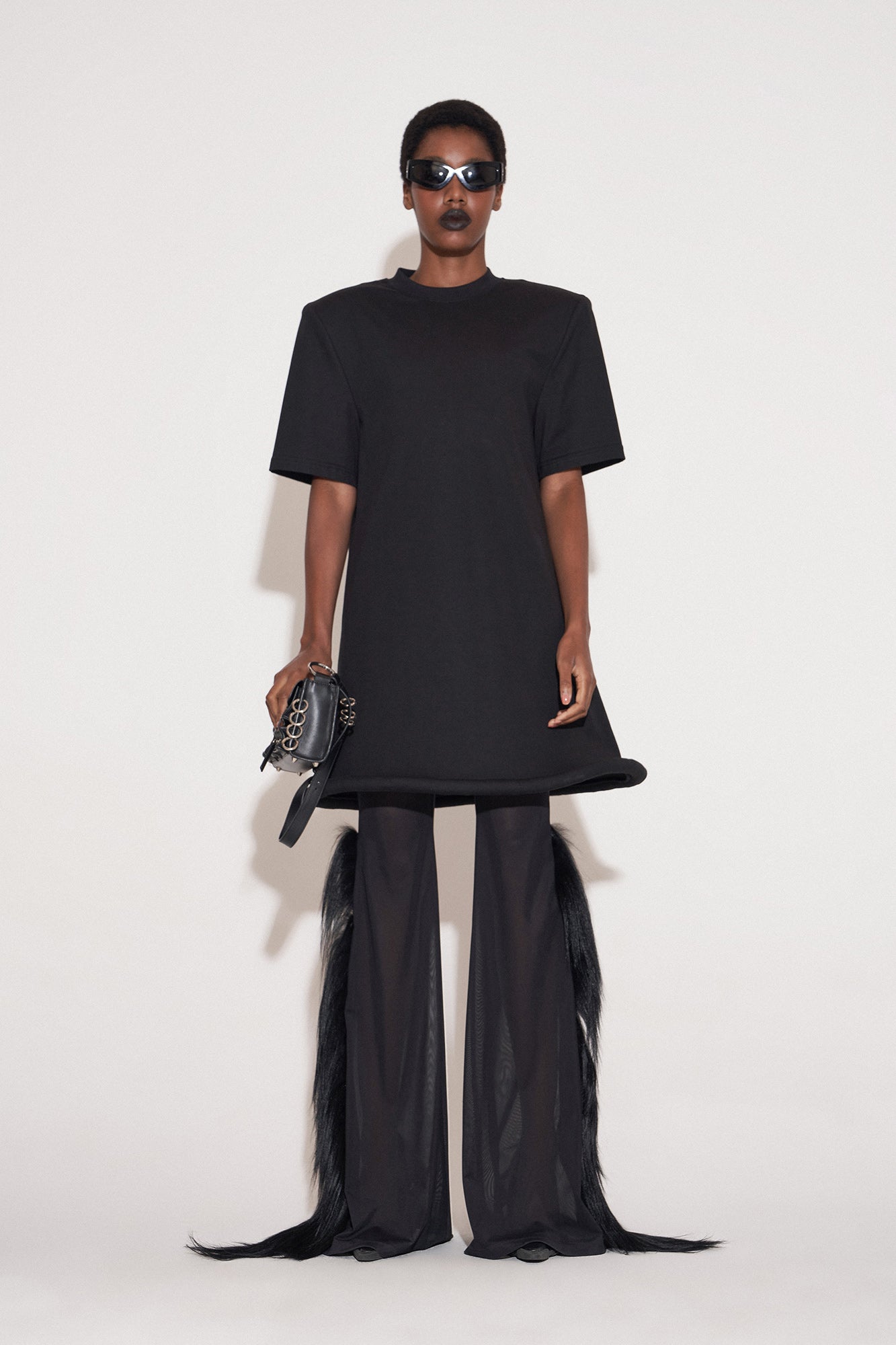 Ufo-hem dress with shoulder pads