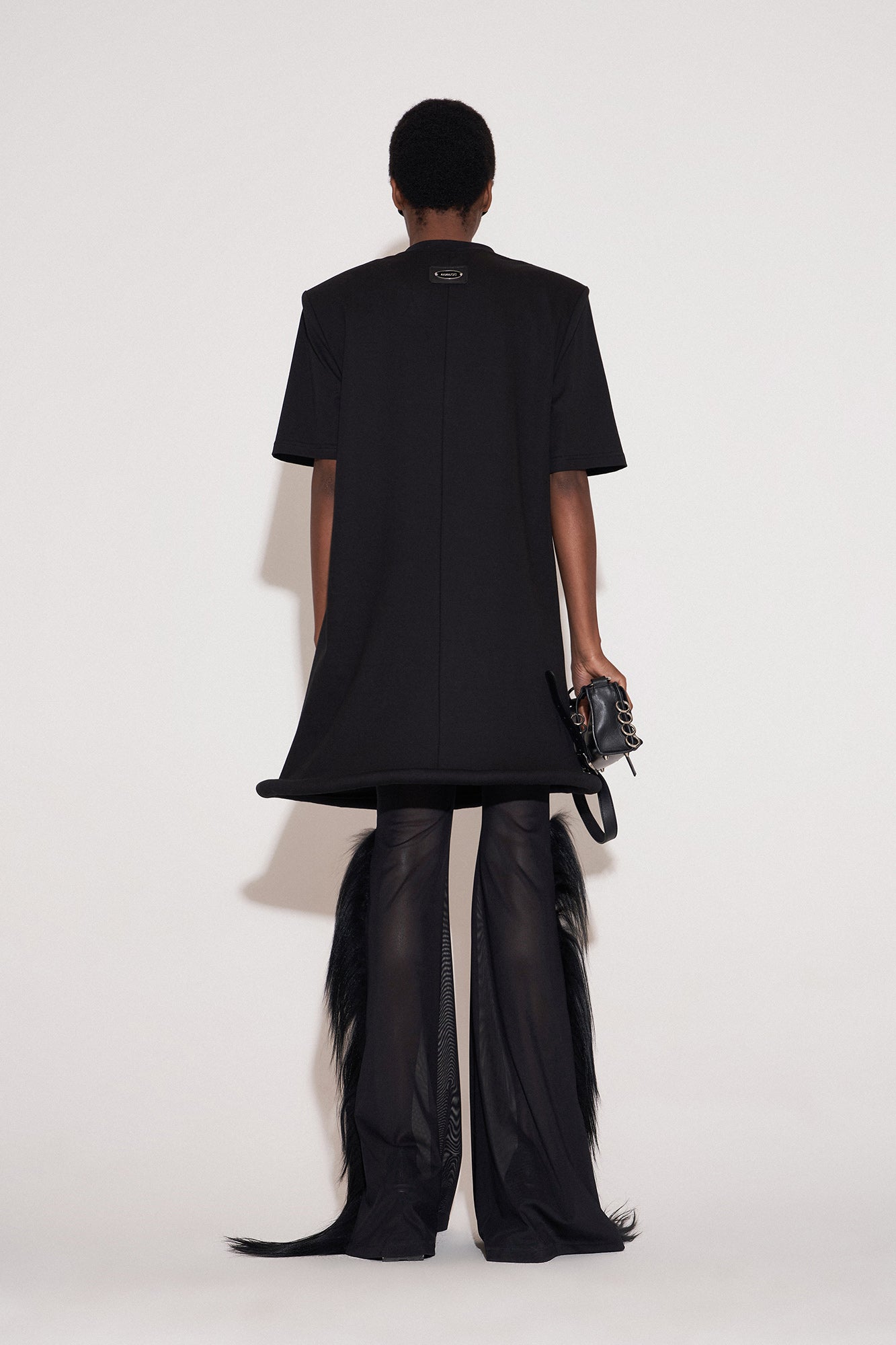 Ufo-hem dress with shoulder pads