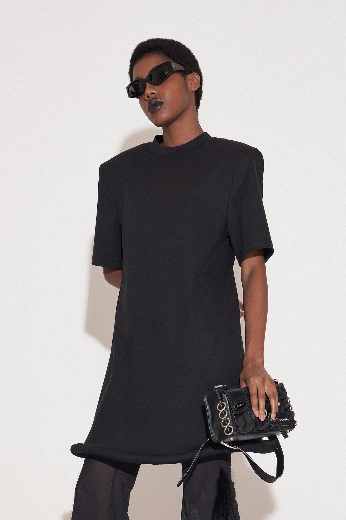 Ufo-hem dress with shoulder pads