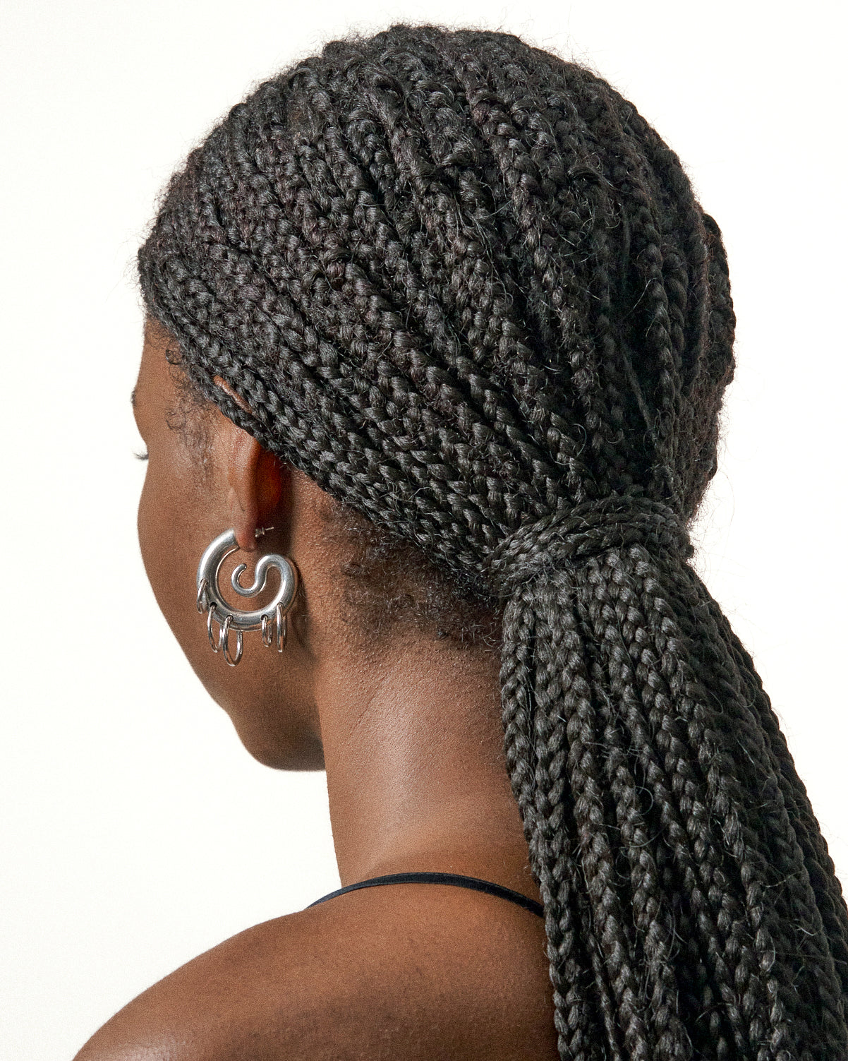 Pierced serpent hoops