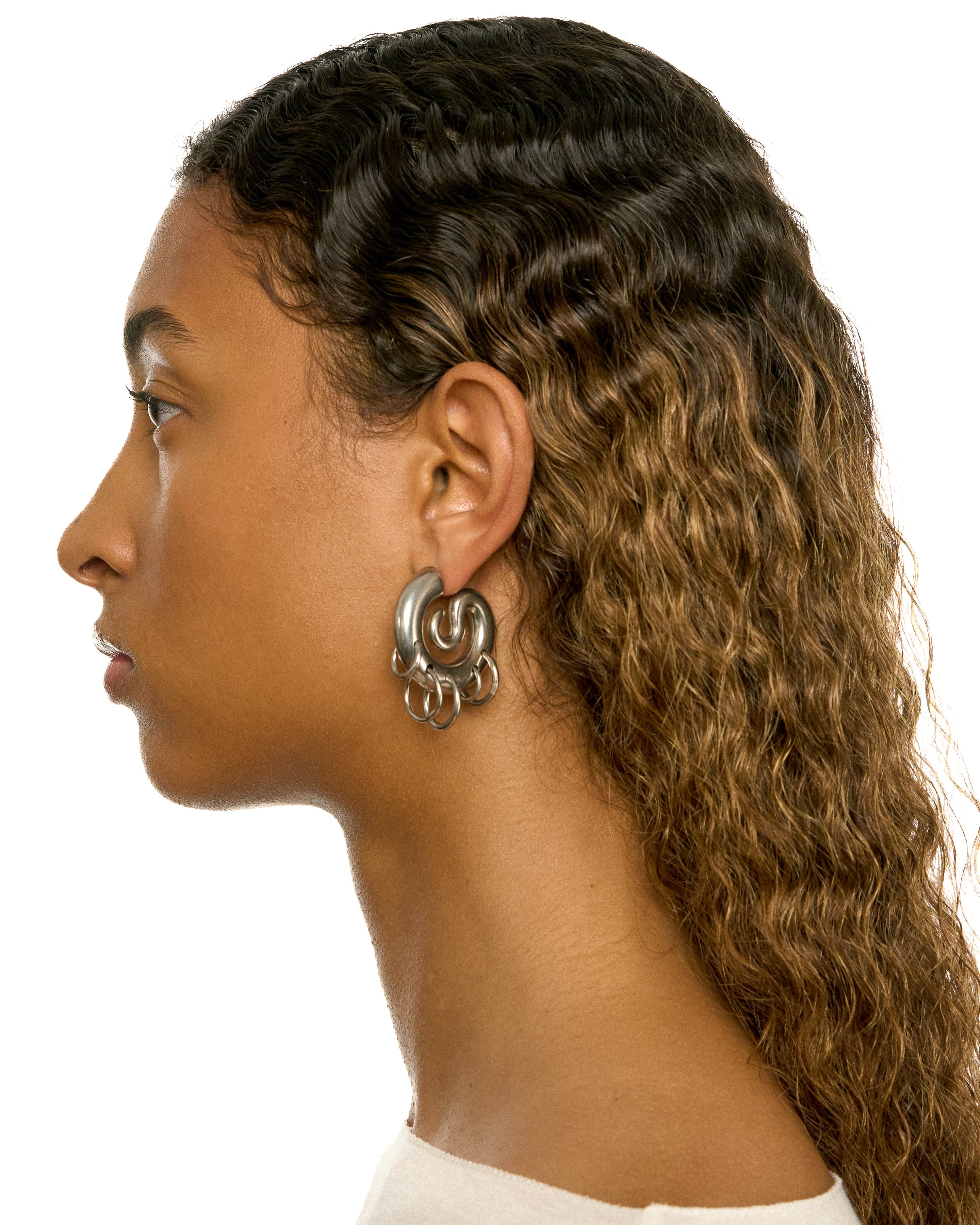 Pierced serpent hoops