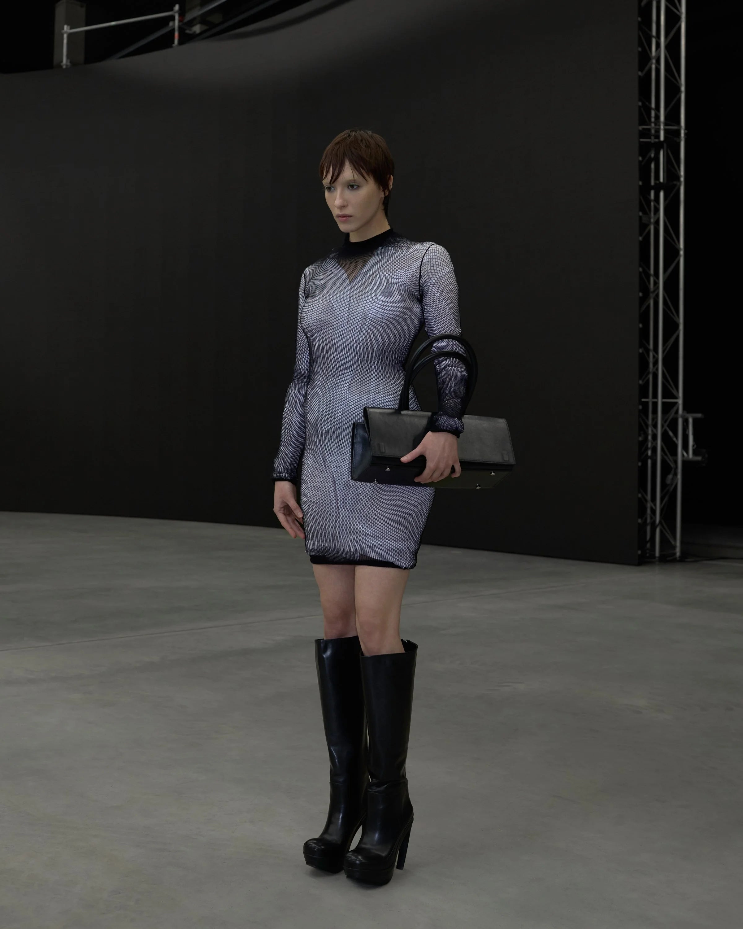 Fishnet-layered kittel dress