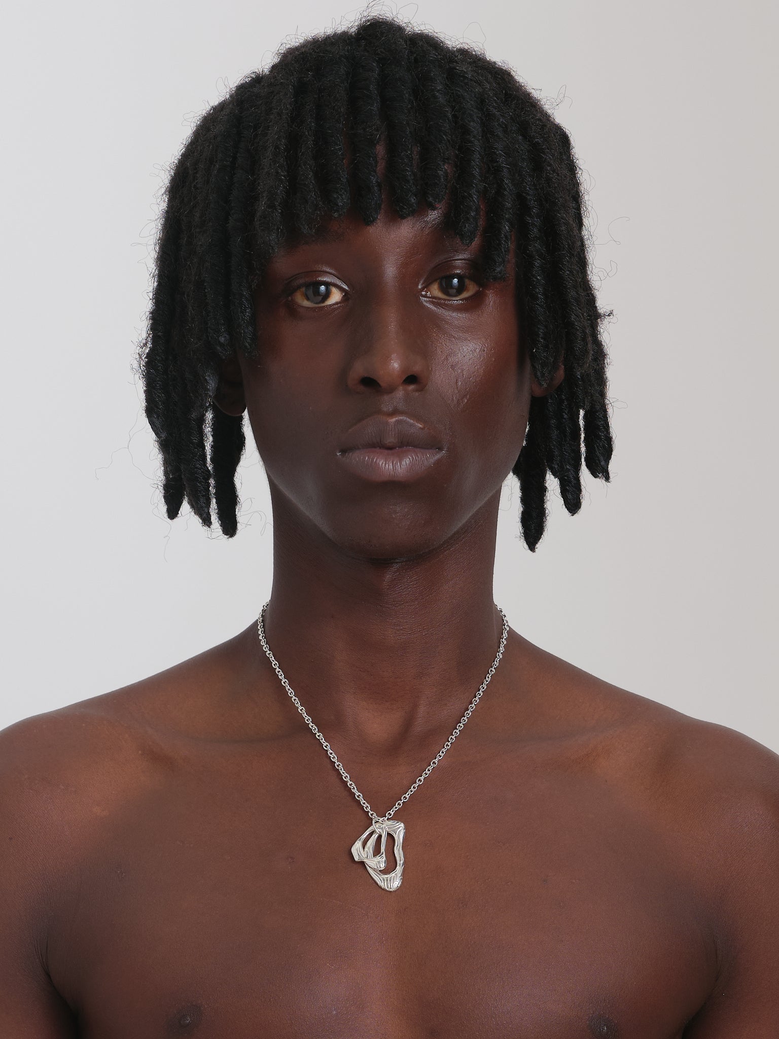 Layered island pendant necklace