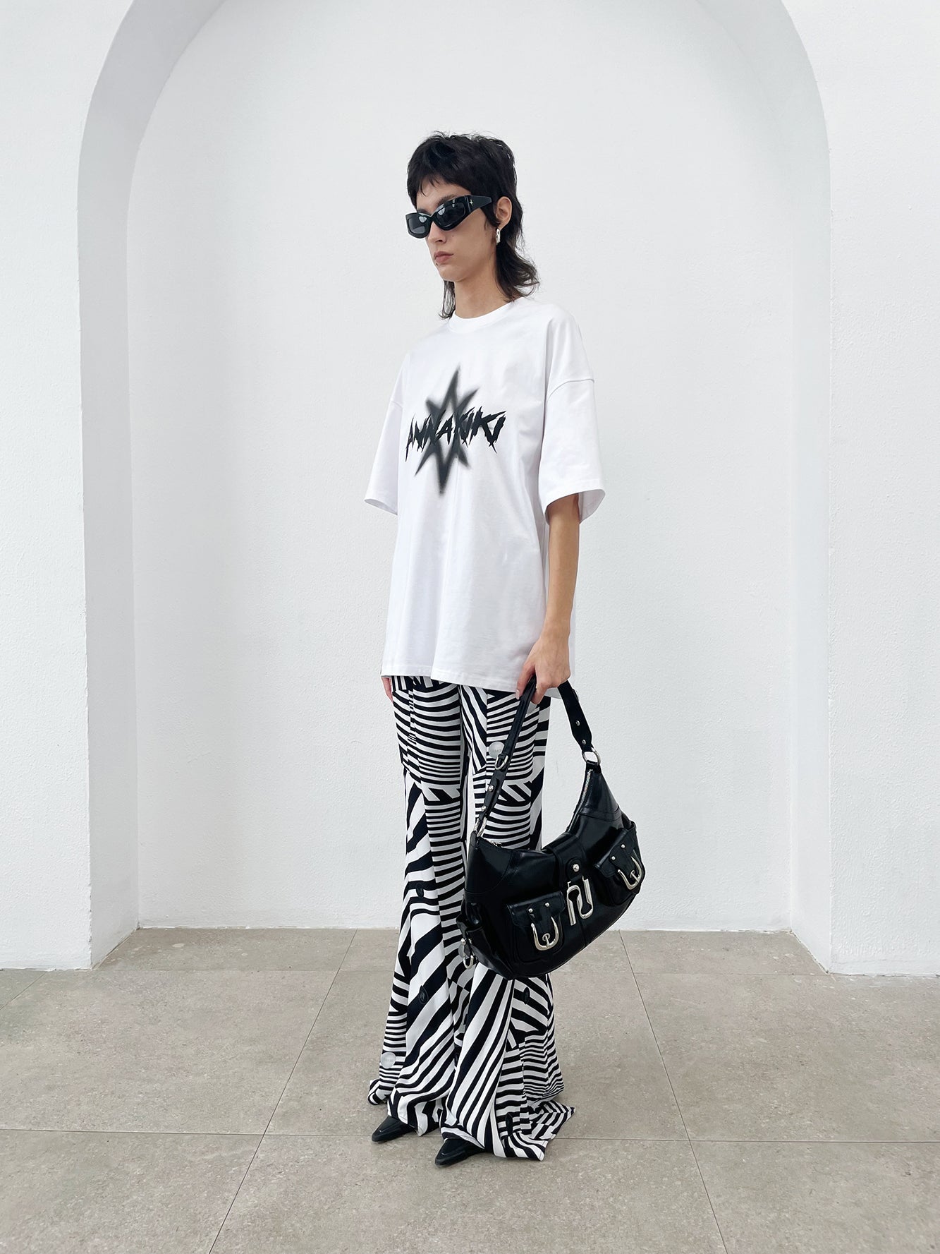 Spiked four-pointed star print loose t-shirt