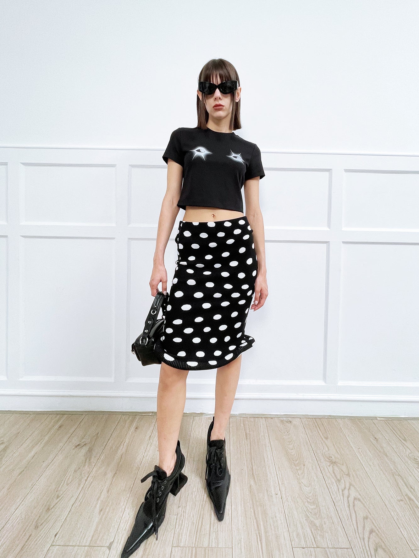 Twisted polka dot knitted half skirt