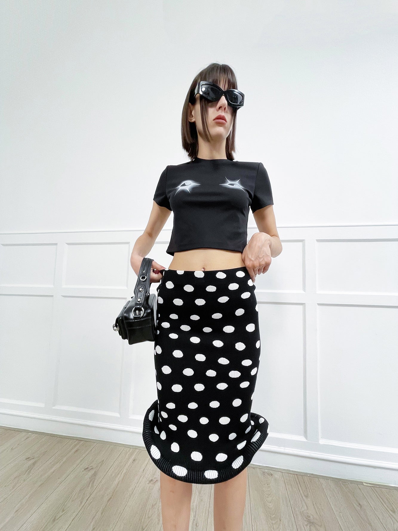 Twisted polka dot knitted half skirt