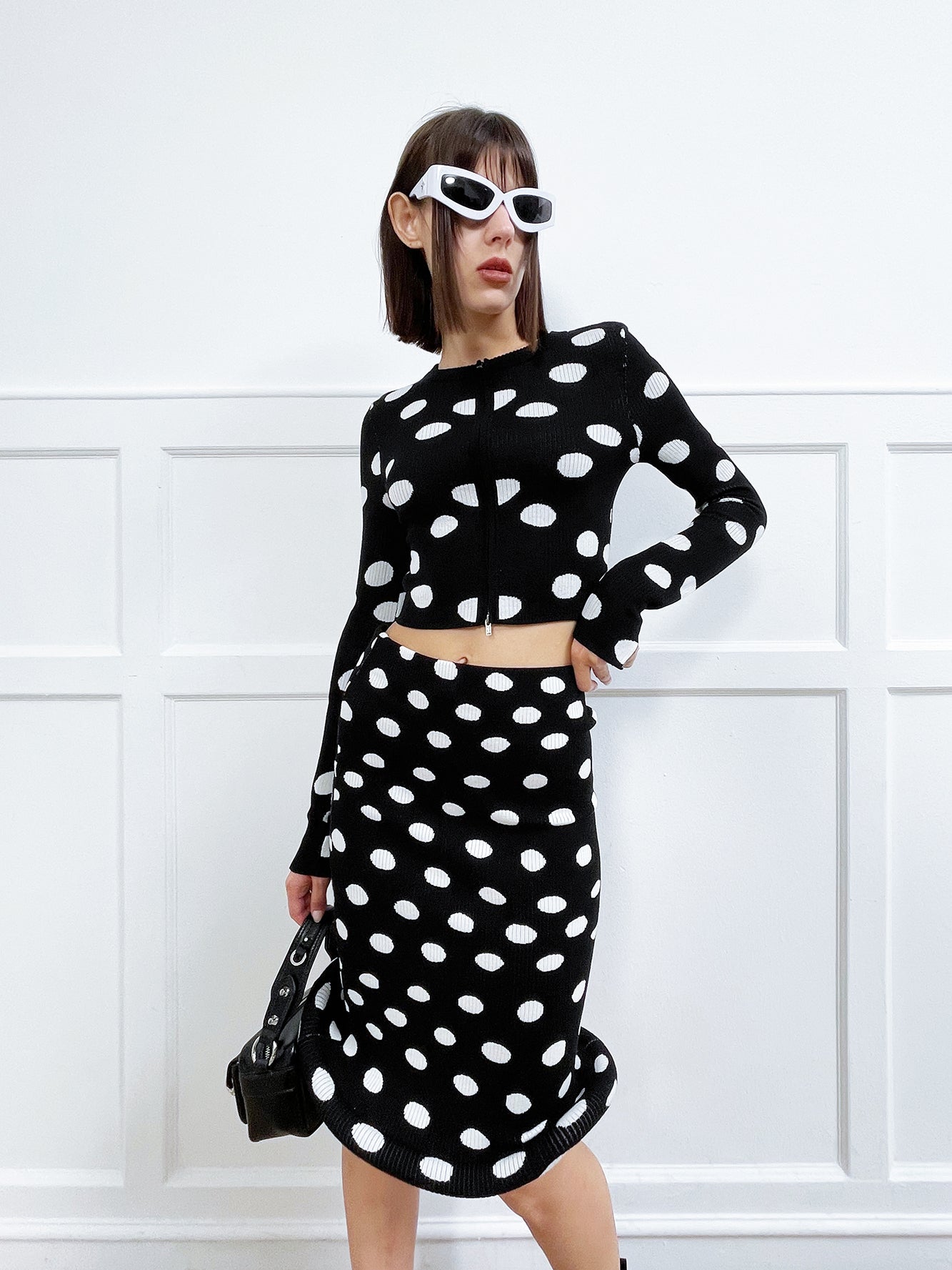 Twisted polka dot knitted half skirt