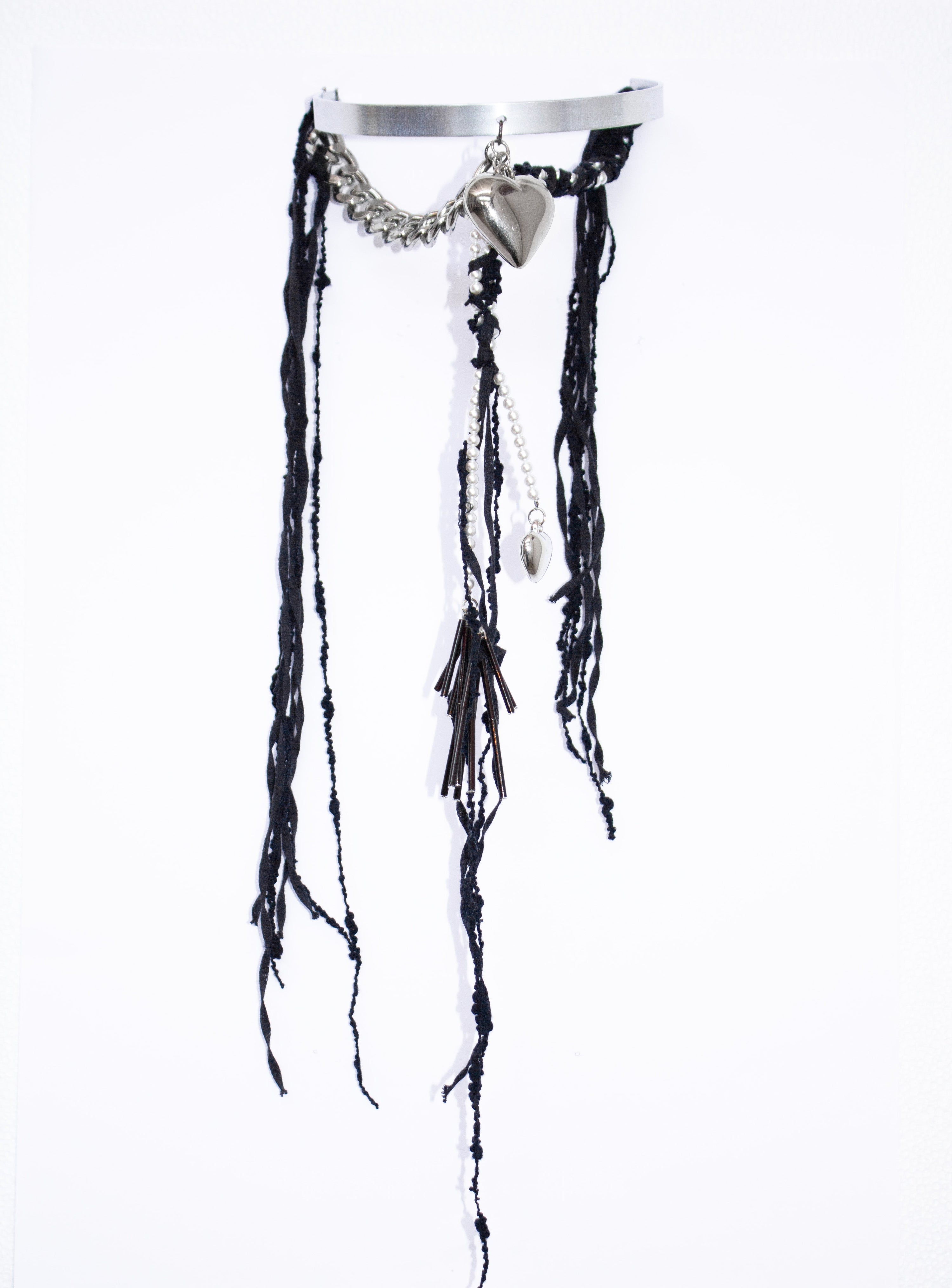 Collana con charms cuore e lacci