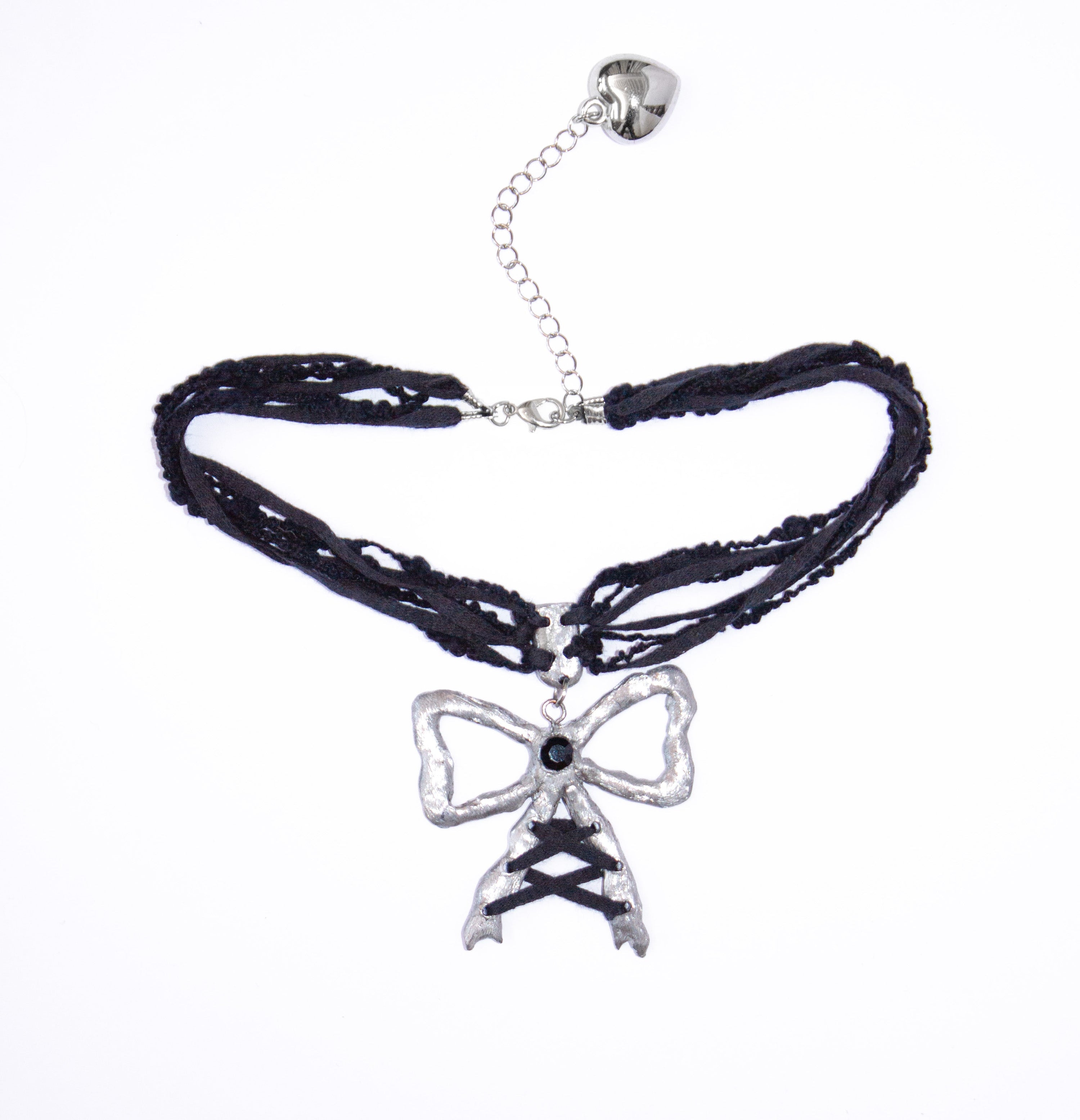 Collana fiocco con charm e lacci