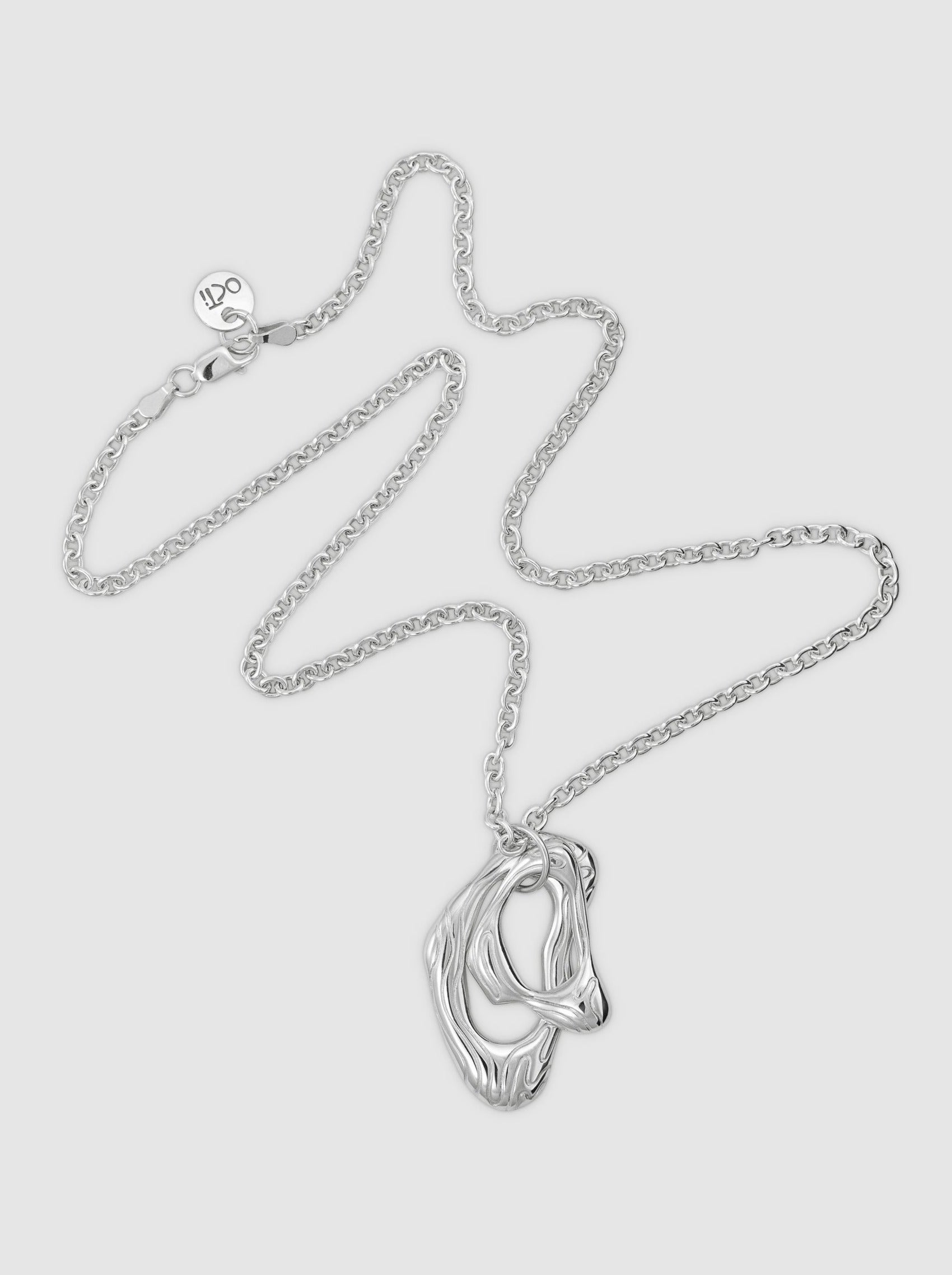 Layered island pendant necklace