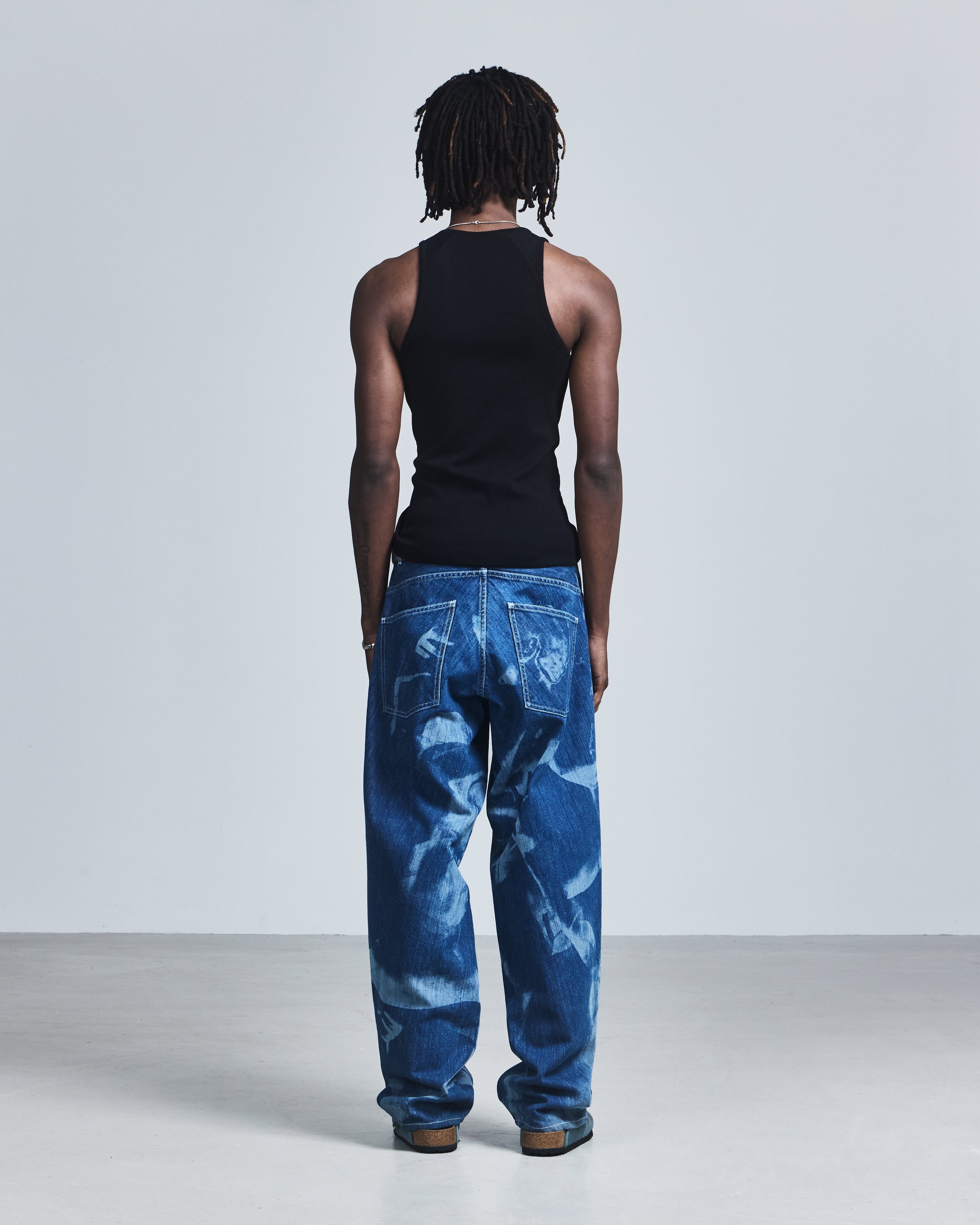 'embrace' laser engraved kinetic jeans