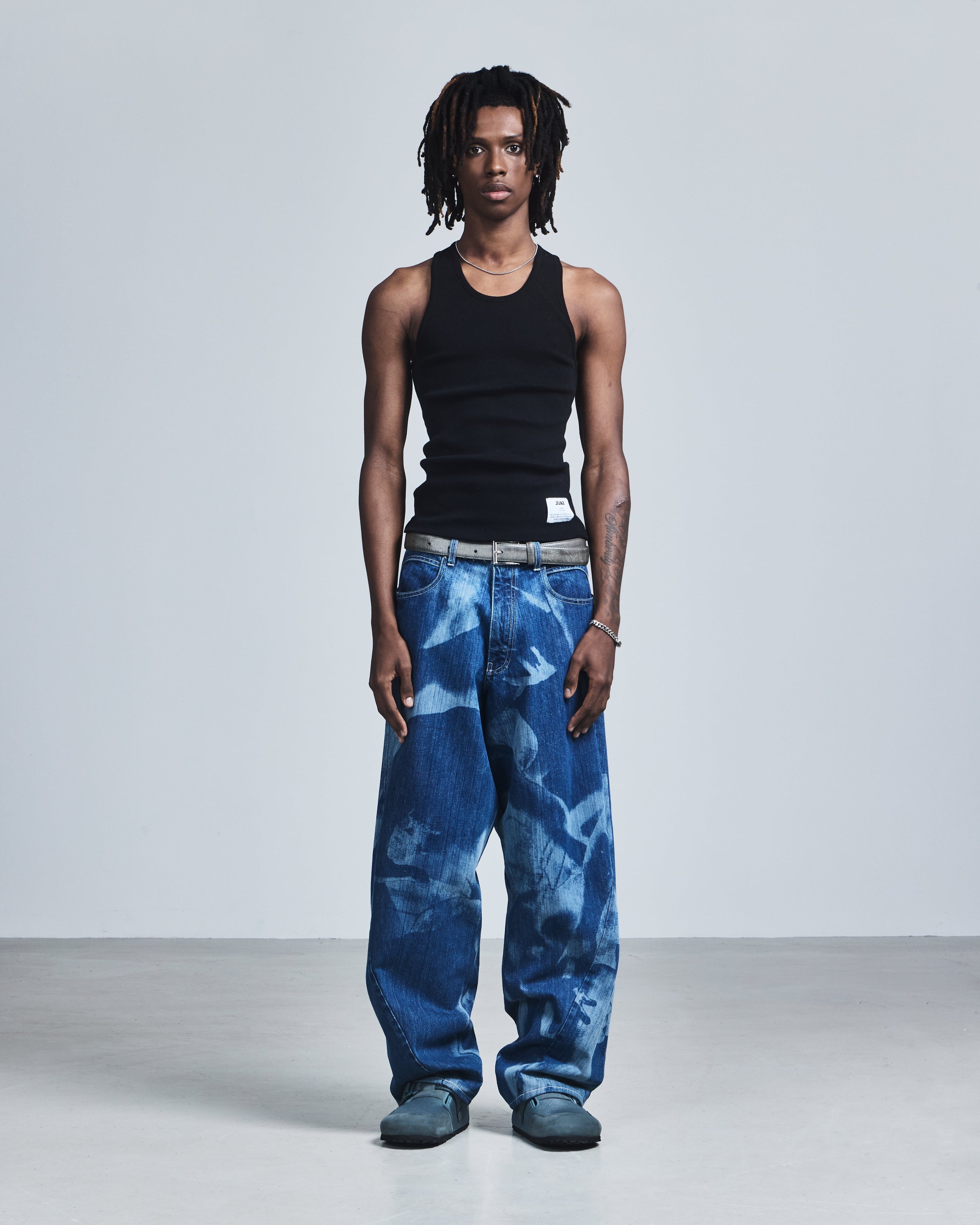 'embrace' laser engraved kinetic jeans