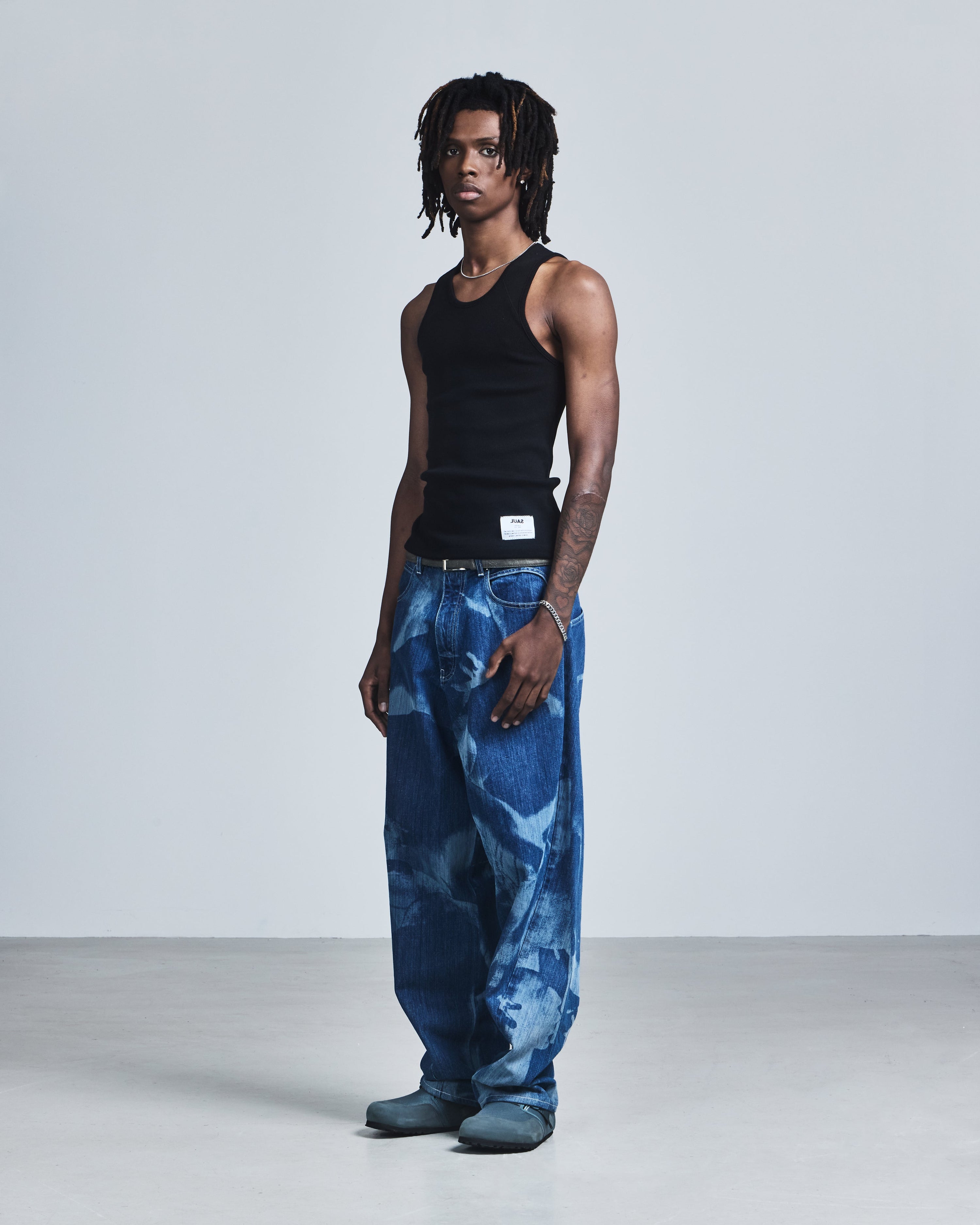 'embrace' laser engraved kinetic jeans