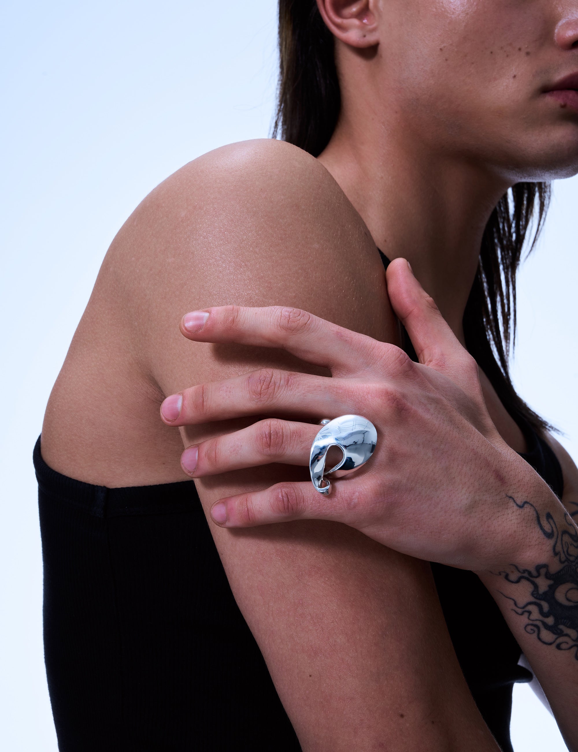 Twirled drop ring