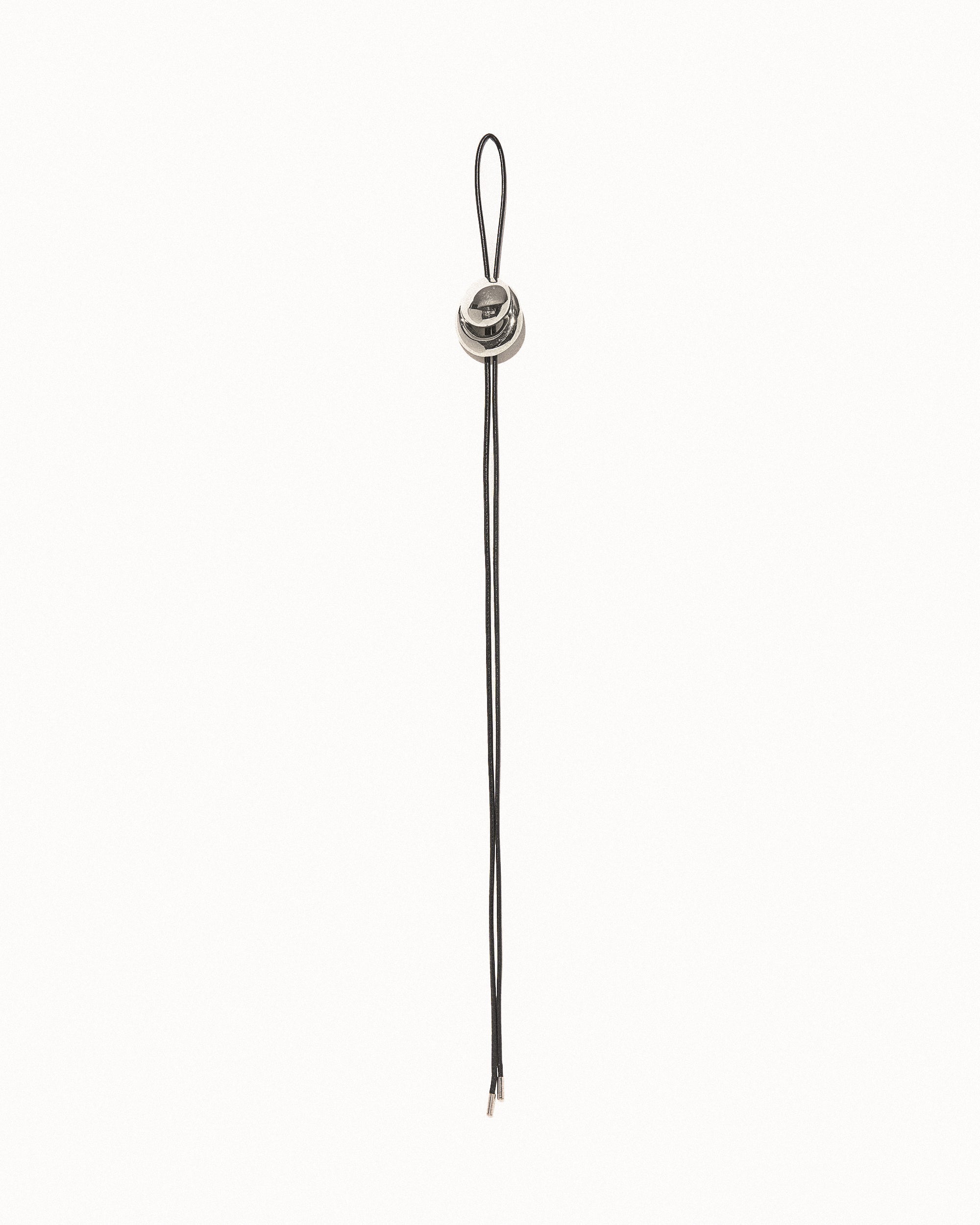 Blow up cord bolo tie