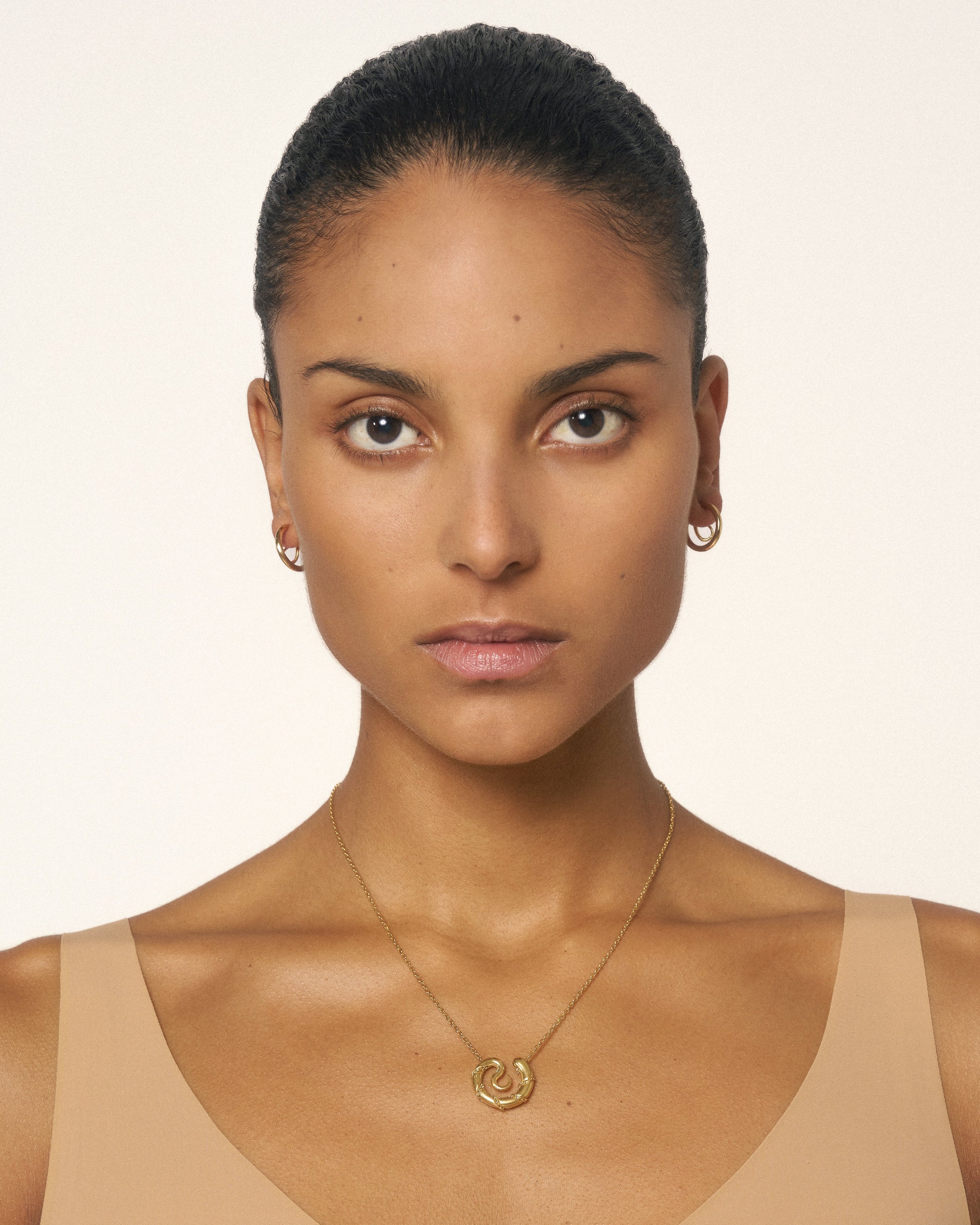 Serpent medallion necklace