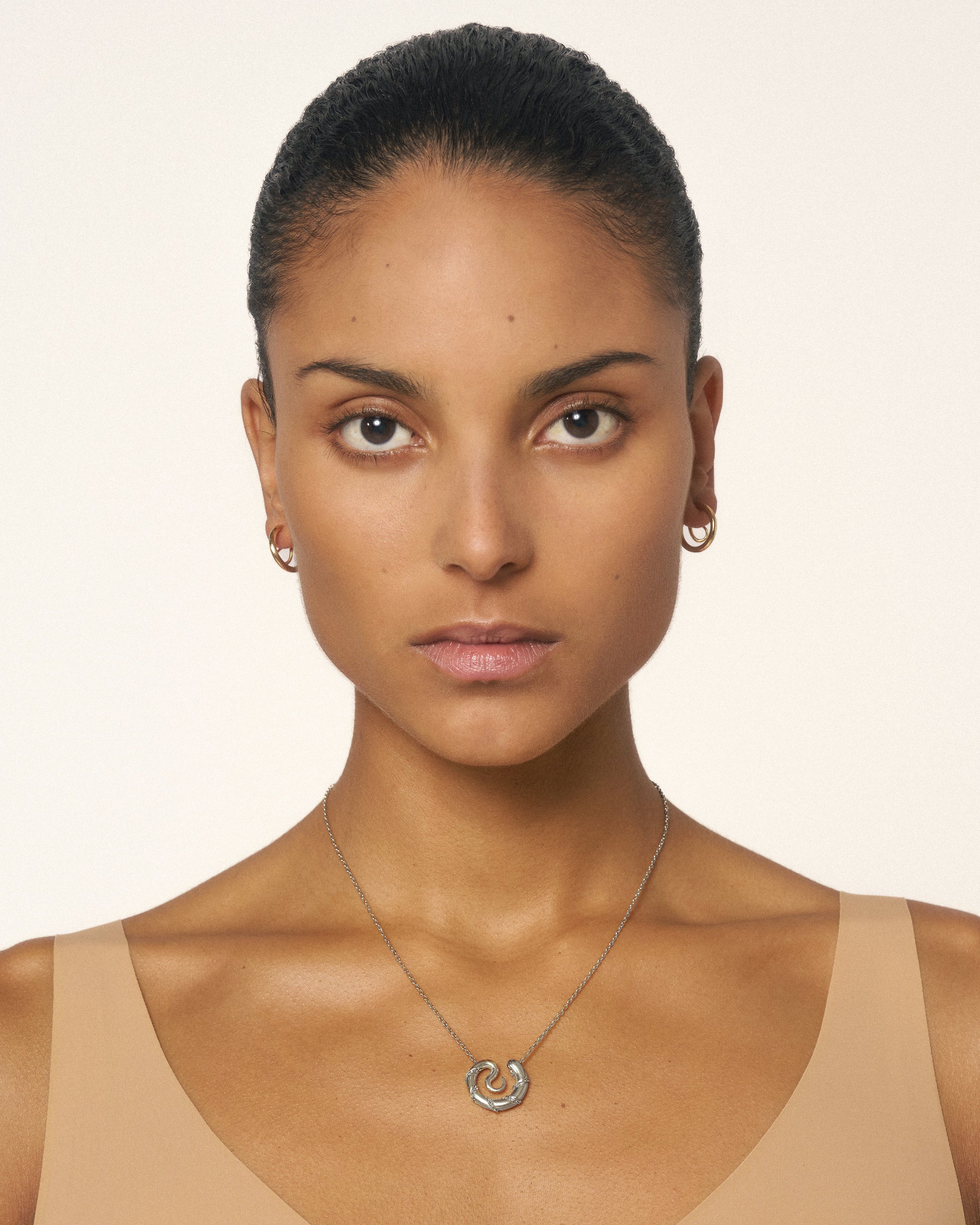 Serpent medallion necklace
