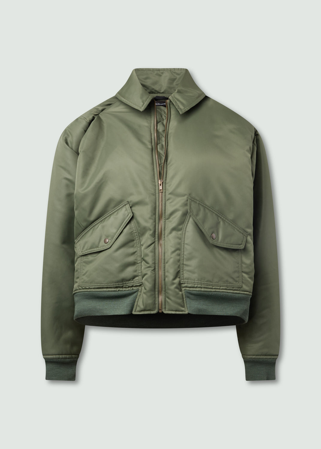 Suspended bomber green