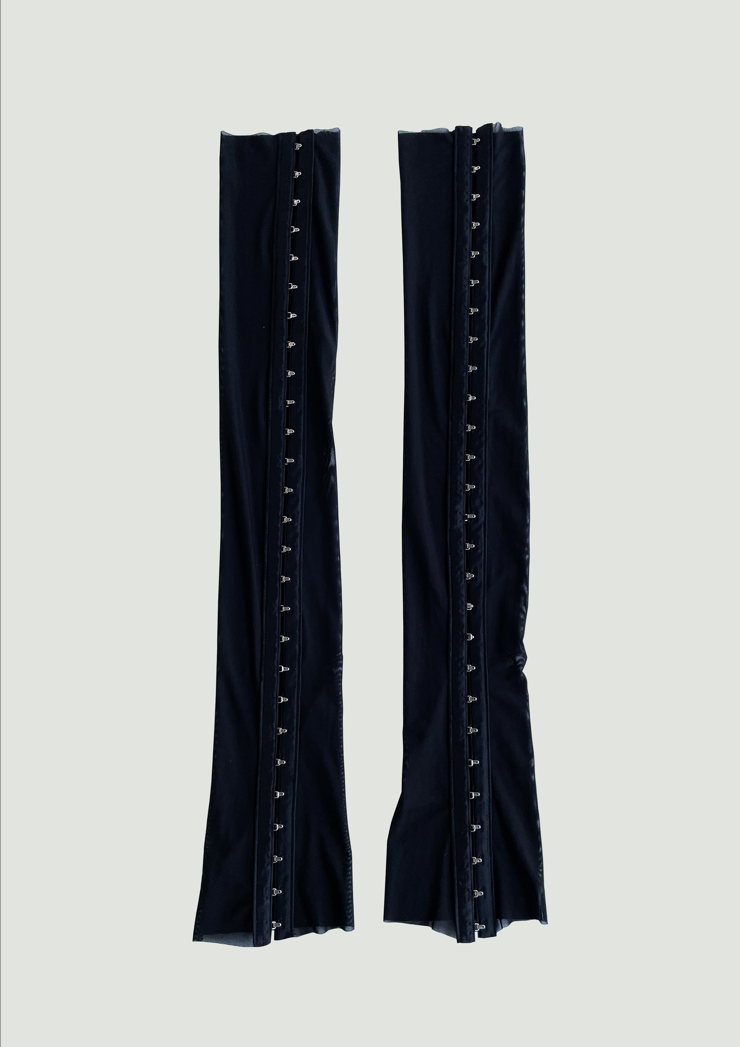 Hook & eye warmers black