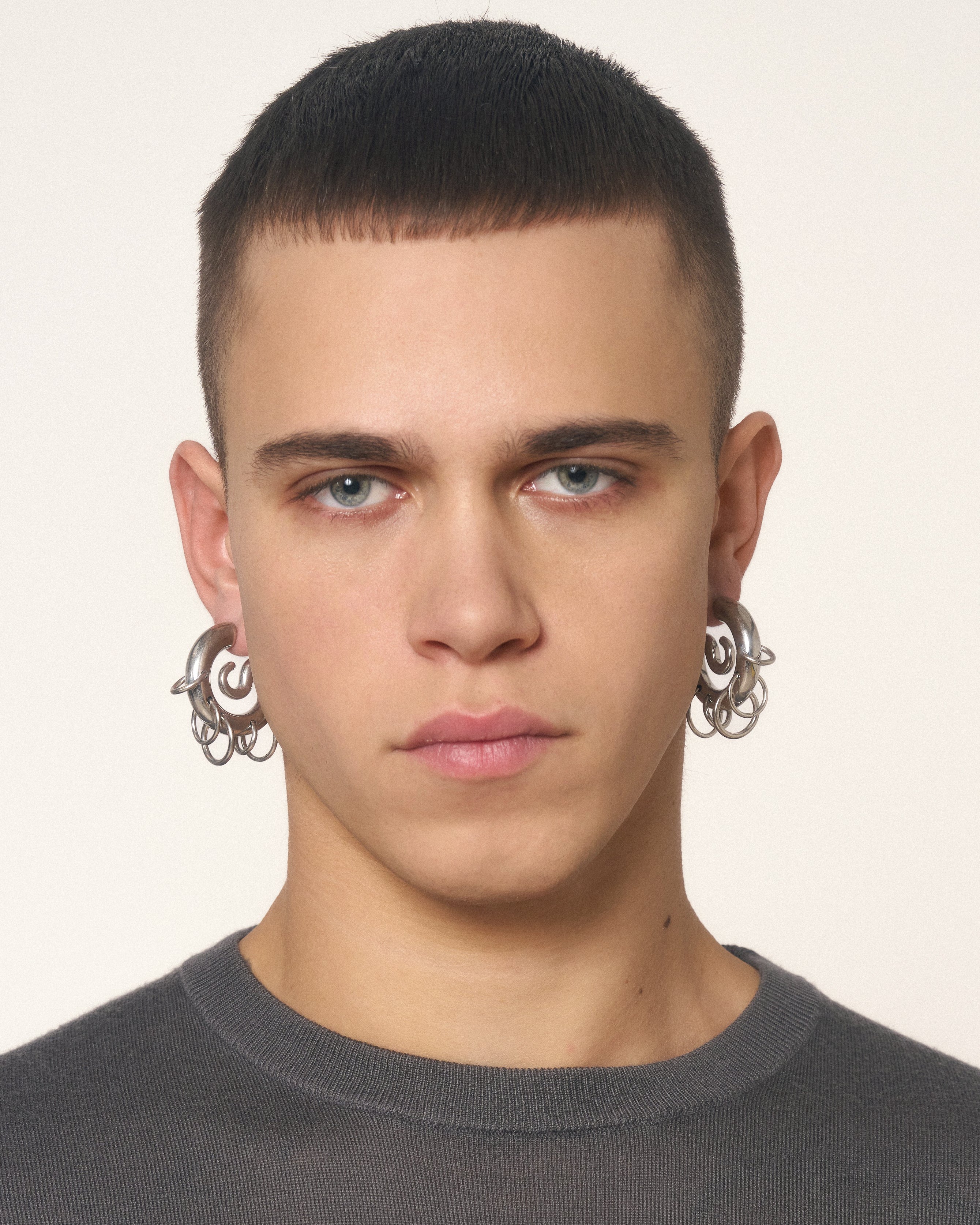 Pierced serpent hoops