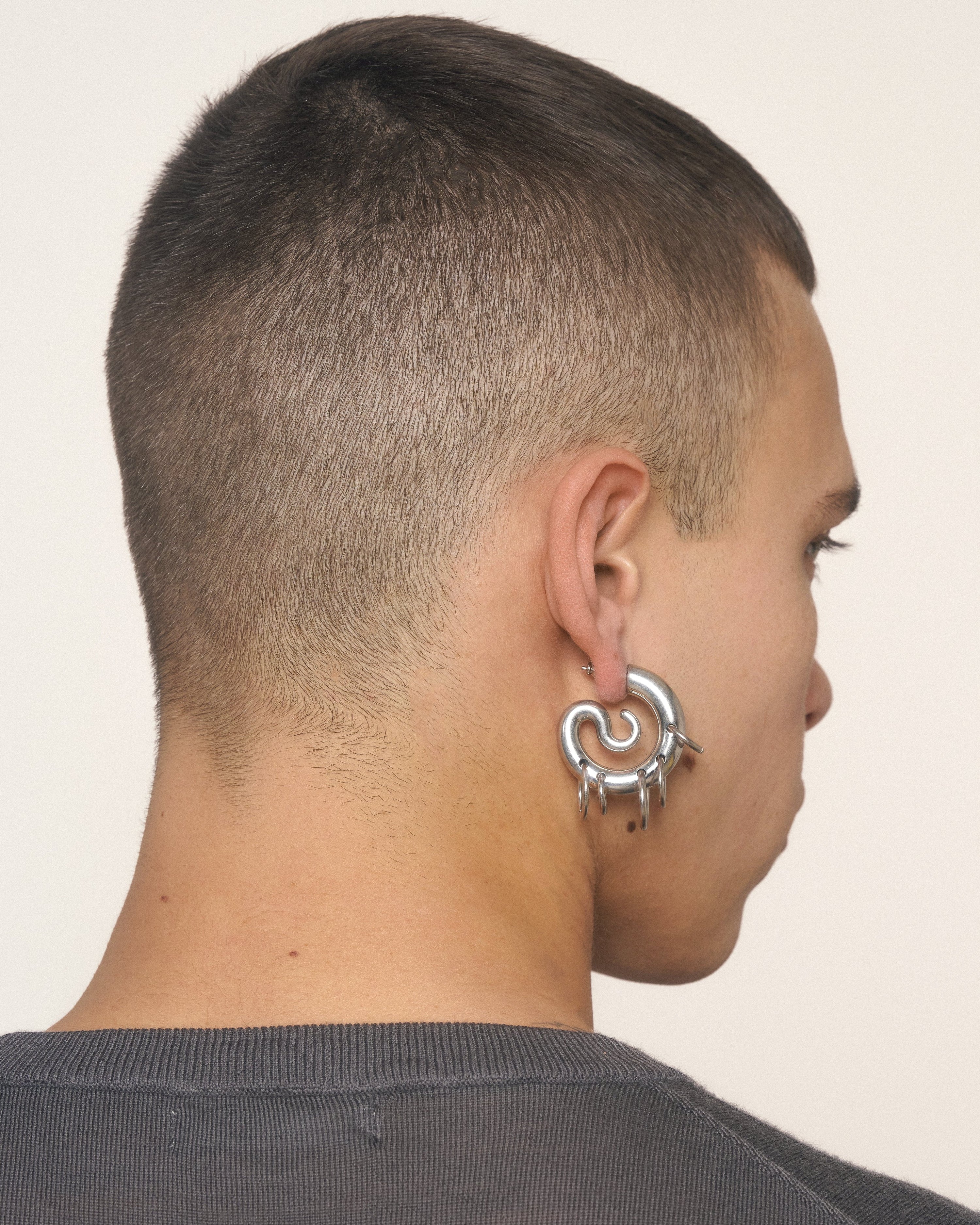 Pierced serpent hoops