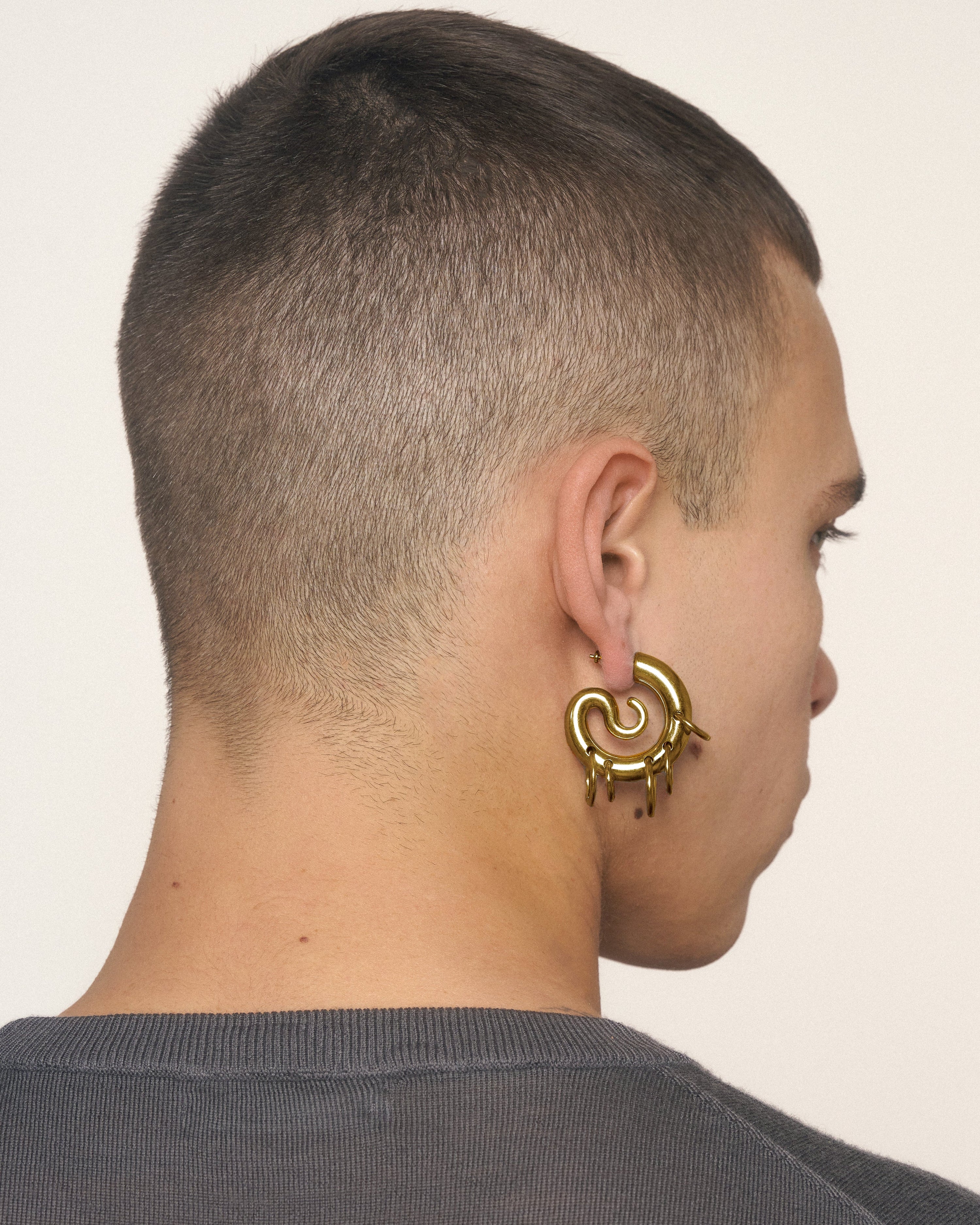 Pierced serpent hoops