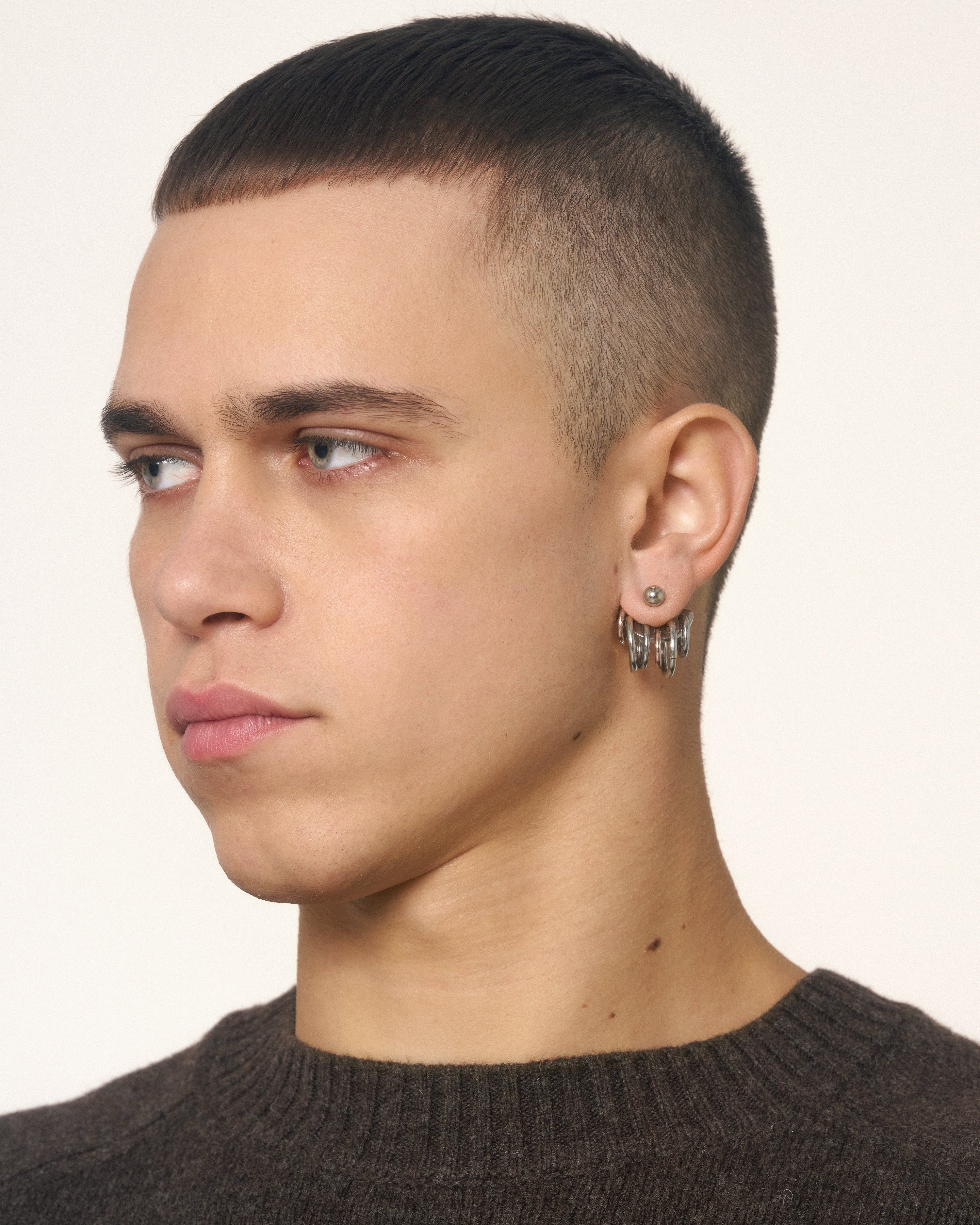 Pierced armor earrings
